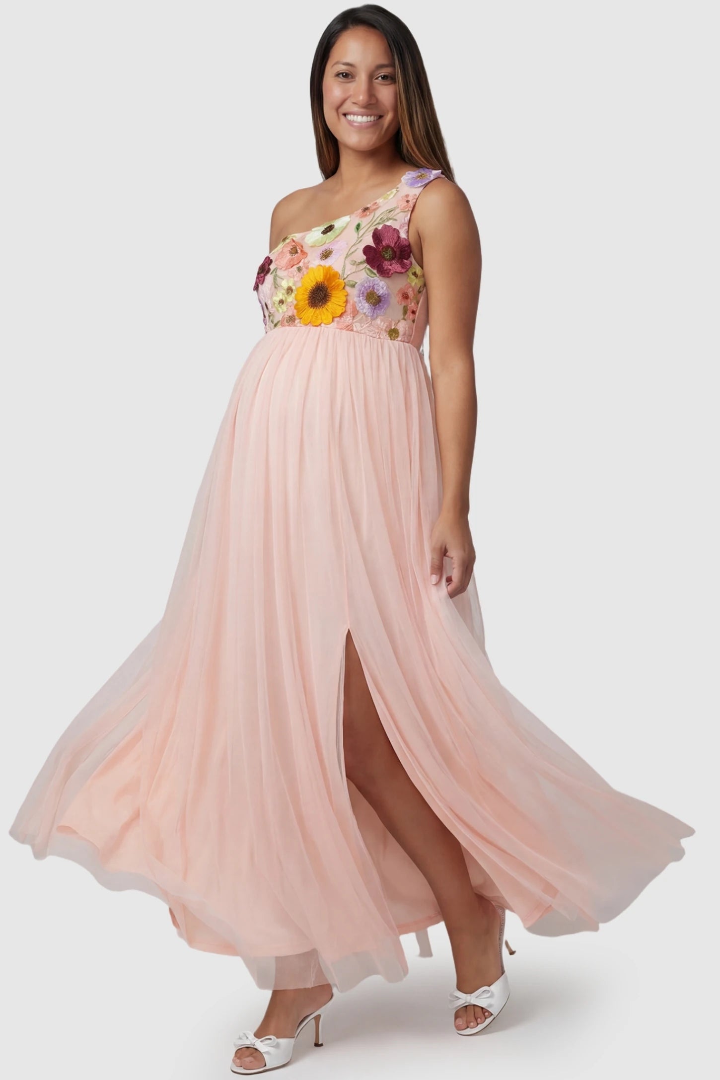 3D Floral One-Shoulder Maternity Gown in Pink featuring a high-slit tulle skirt on a pregnant model.