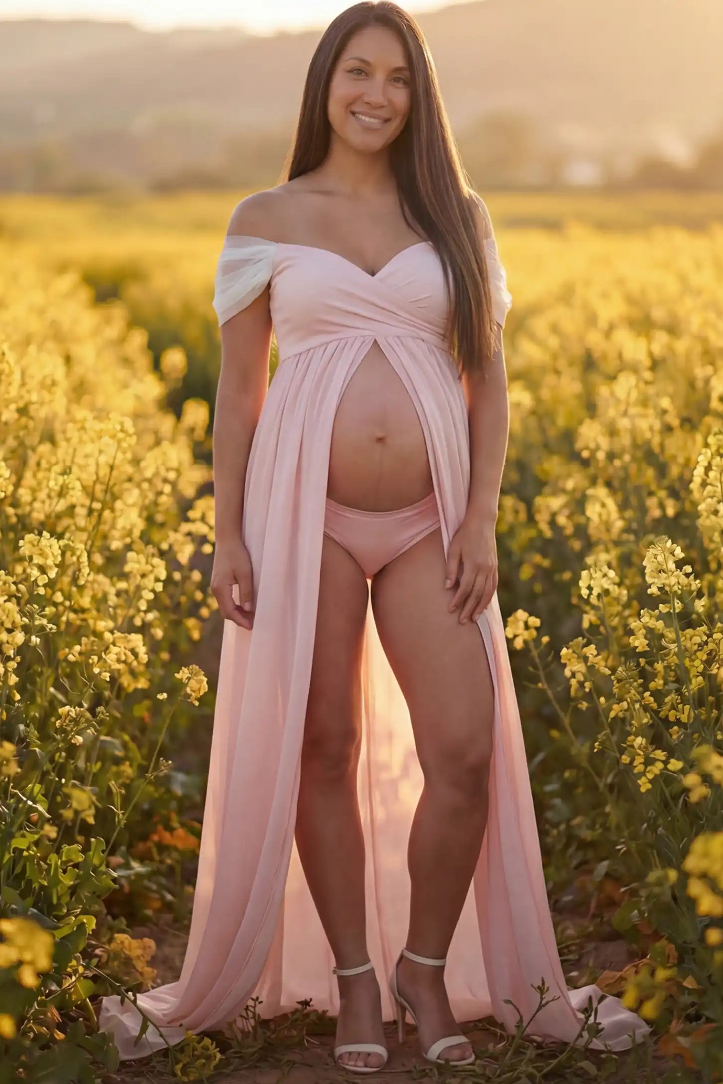 Cap Sleeve Empire Waist Maternity Photoshoot Gown in pink featuring sweetheart neckline and flowy skirt on pregnant model. front view