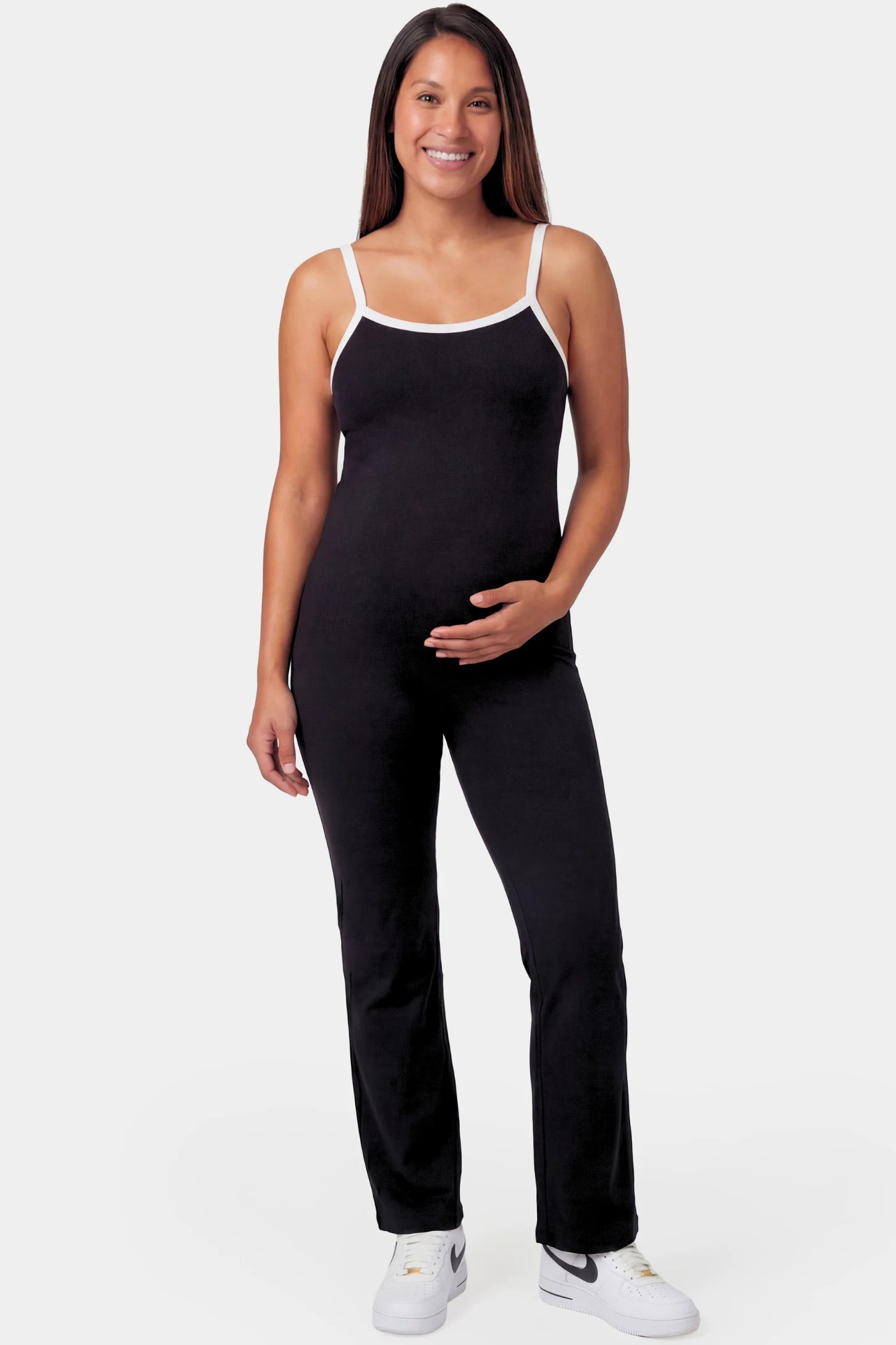 Scoop Neck Contrast Trim Maternity Jumpsuit in black featuring spaghetti straps and contrast trim on a pregnant model.