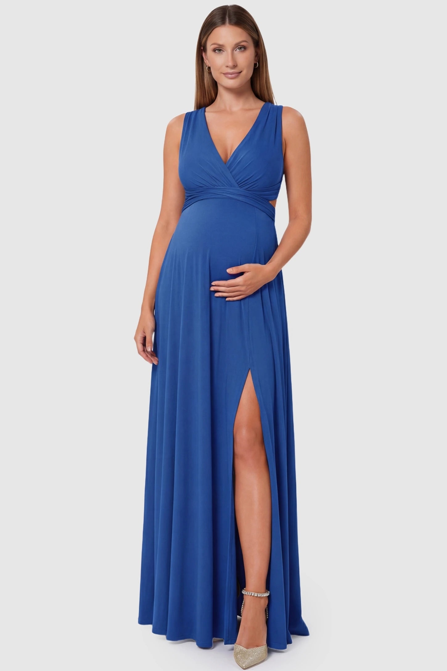 Blue V-Neck Cross-Back Maxi Maternity Dress featuring a high side-slit and deep neckline on a pregnant model.