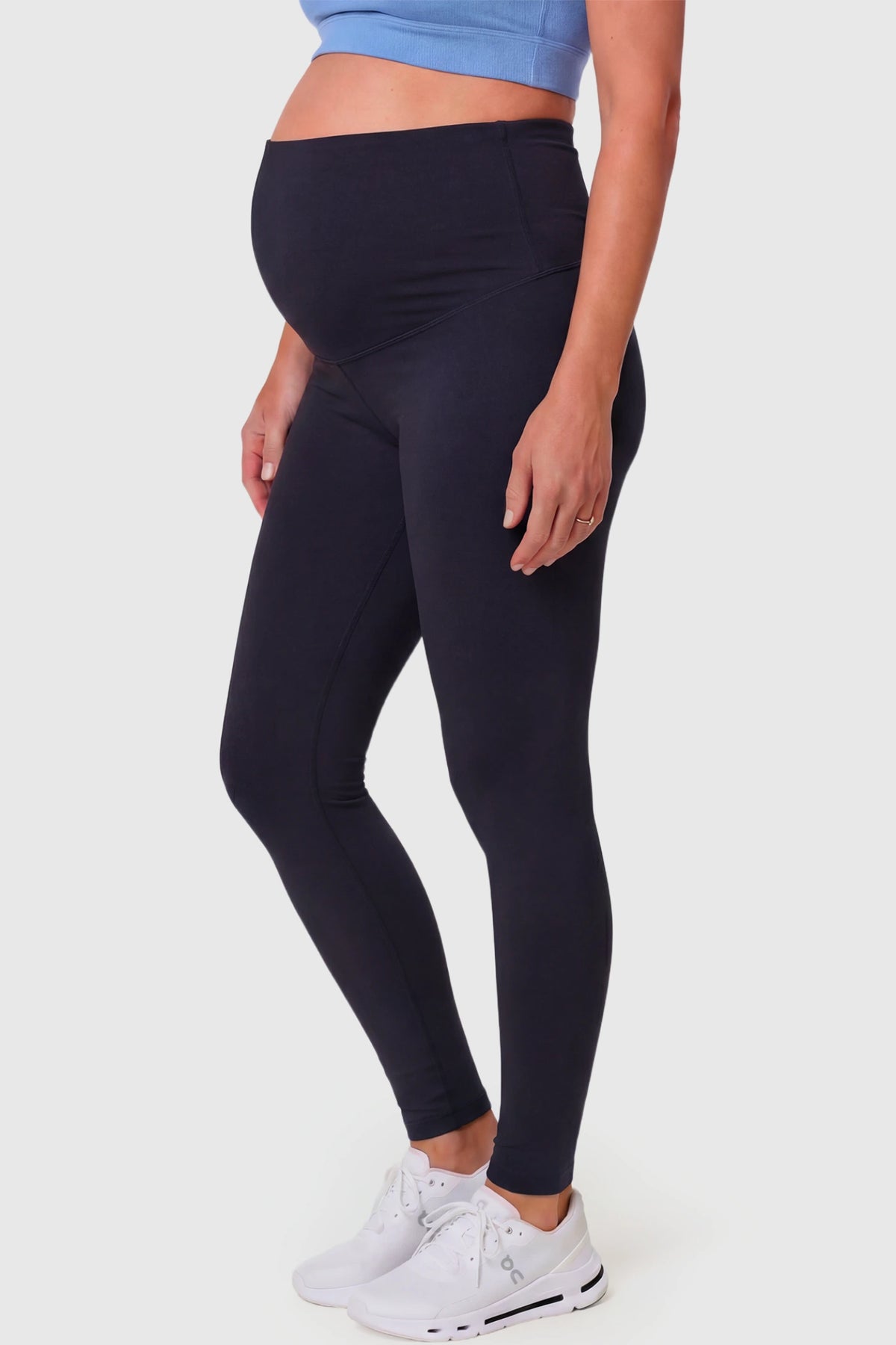 Full-Panel Ankle-Length Maternity Yoga Leggings in black featuring over-the-belly support and full-length fit on pregnant model.