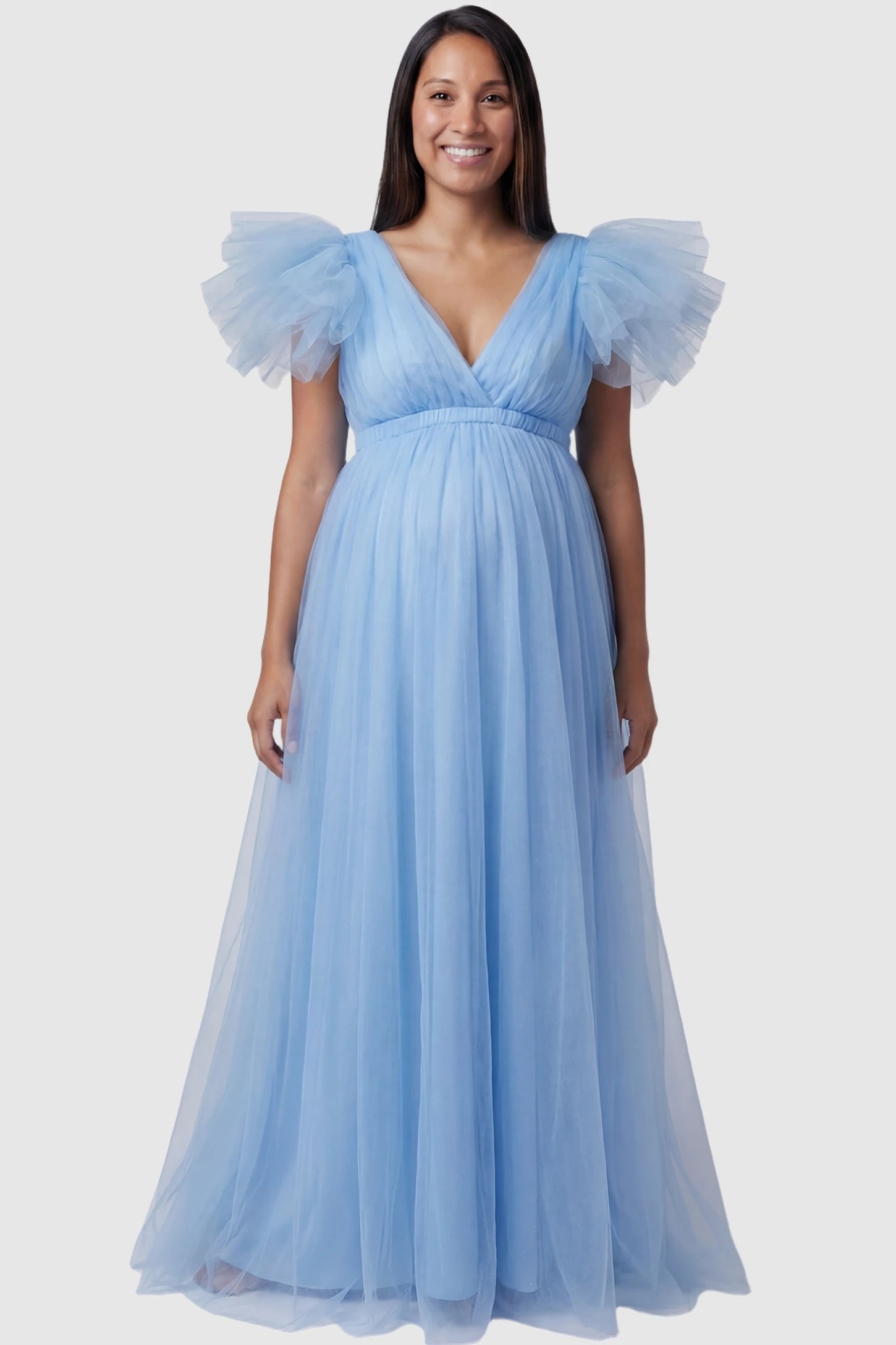 Layered Tulle Ruffle Sleeve Maternity Photoshoot Dress in Sky Blue featuring a plunging neckline on a pregnant model.