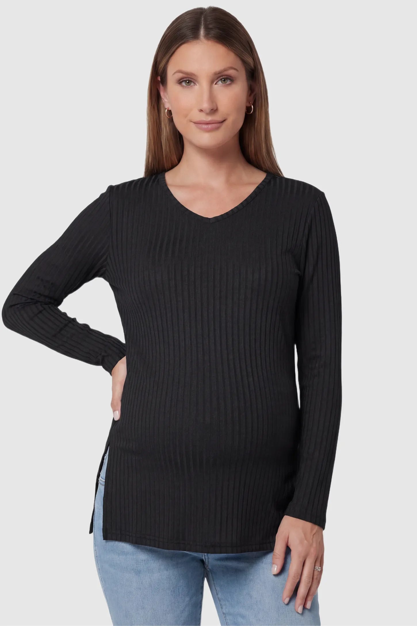 Ribbed V-Neck Longline Maternity Top in Black featuring a relaxed longline tunic silhouette on pregnant model, front view.