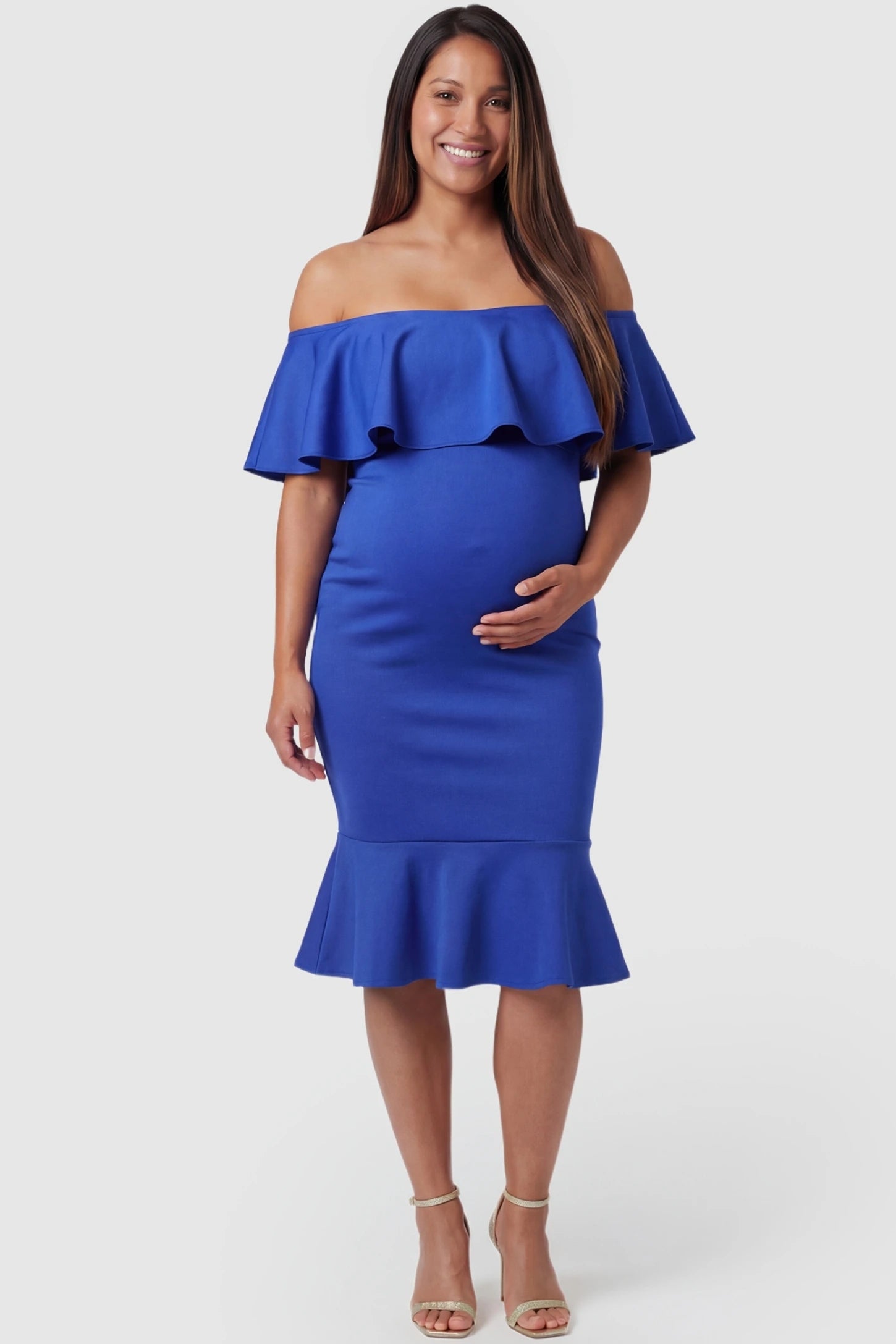 Ruffled off-shoulder mermaid hem midi maternity dress in dark blue featuring retro-inspired ruffles in front view on a pregnant model