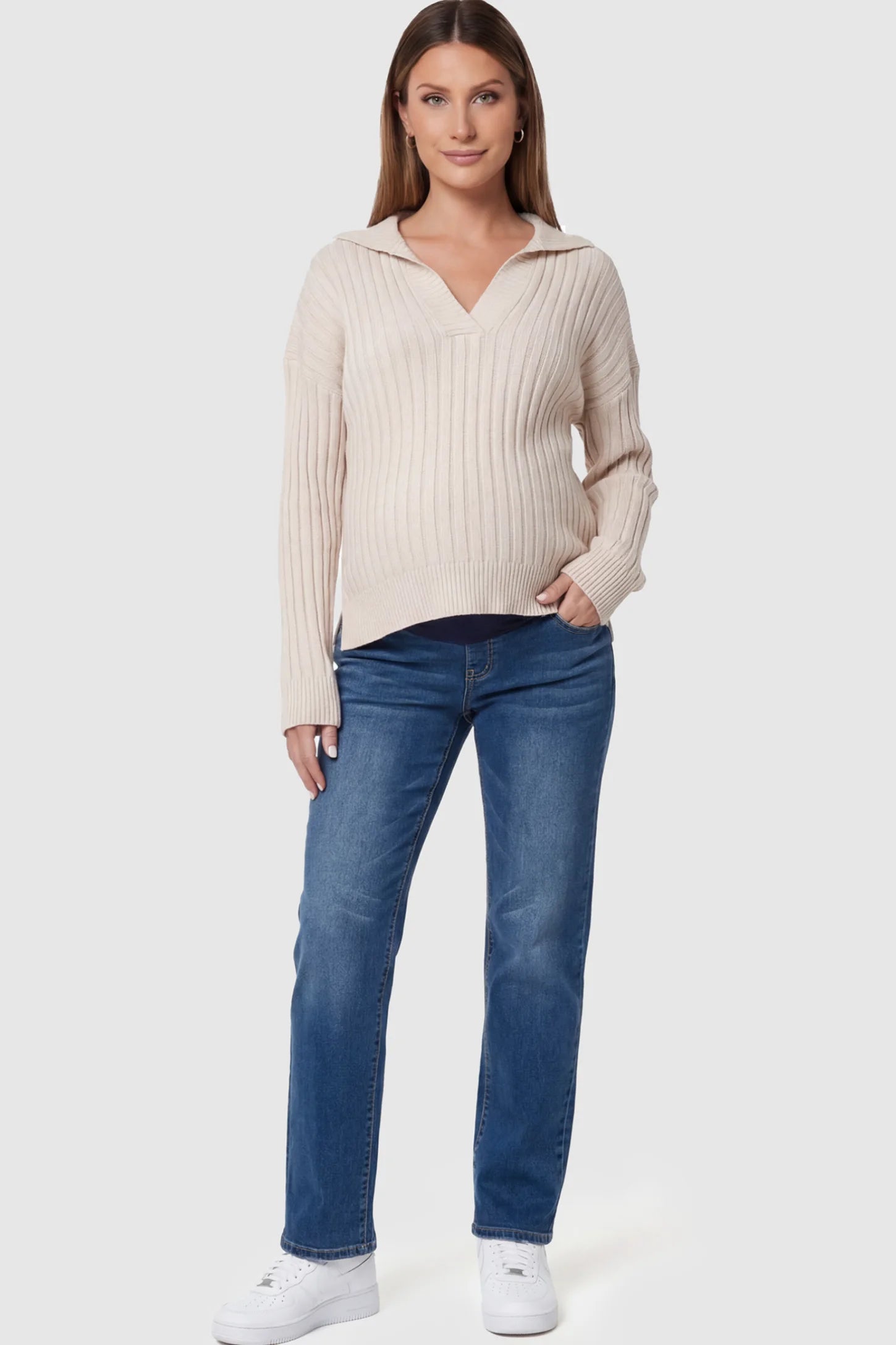 Full Panel Stretch Straight Leg Maternity Jeans in Blue featuring a seamless navy waistband on a pregnant model facing front.