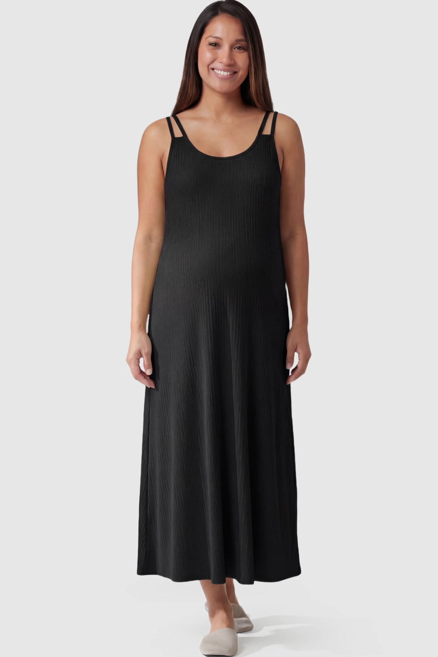 Double-Strap Sleeveless Maternity Slip Dress in black ribbed knit fabric on a pregnant model.