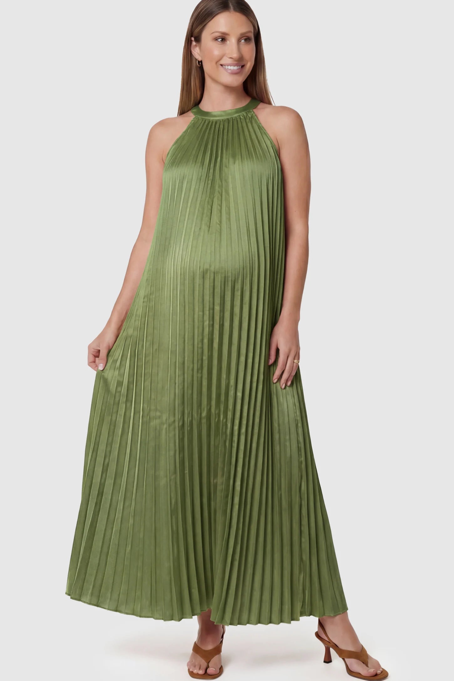 Pleated Faux Silk Halter Maternity Maxi Dress in Green featuring micro-pleat texture on a pregnant model facing front.