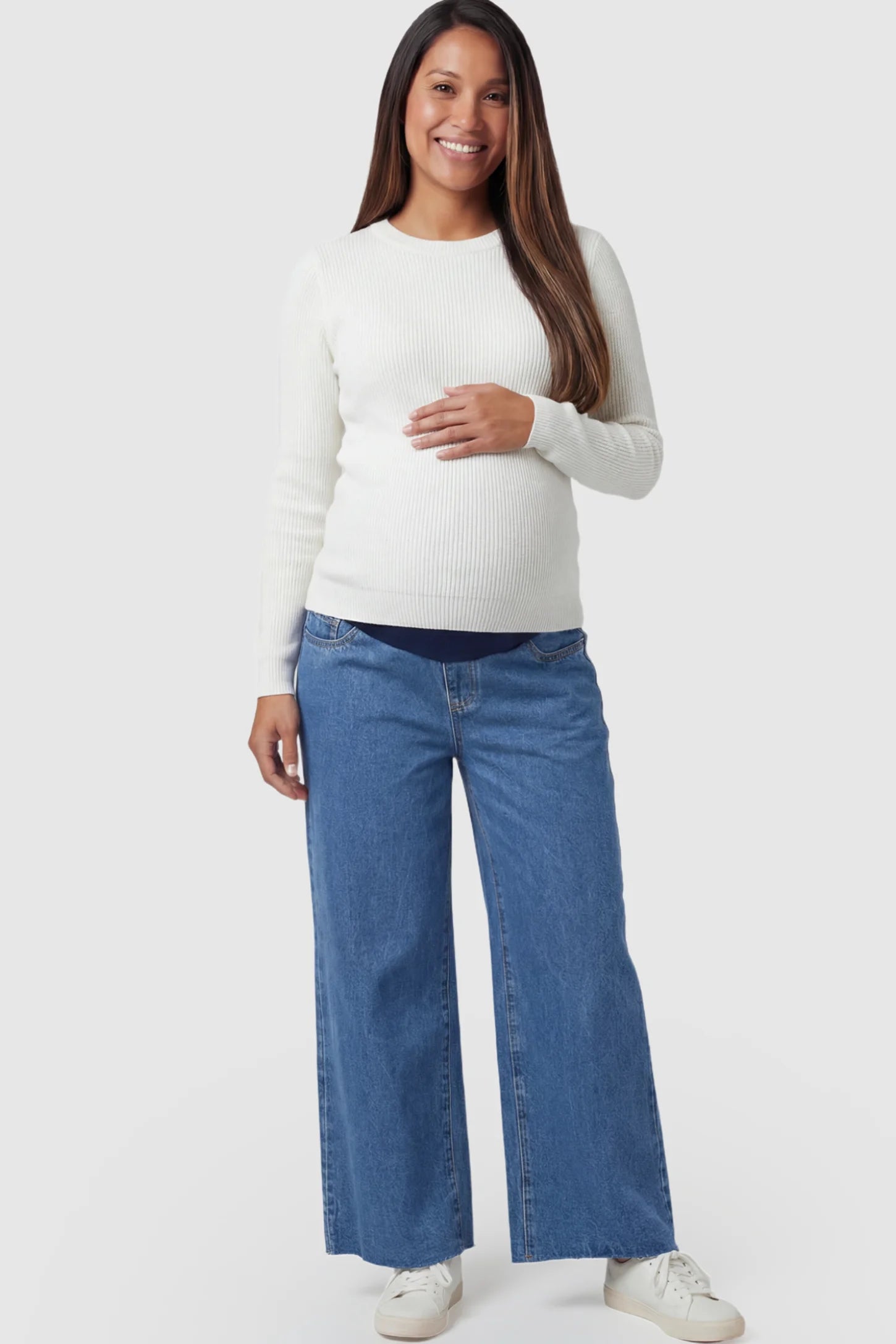 Raw Hem Full Panel Wide Leg Maternity Jeans in dark blue featuring a high-rise navy belly band on a pregnant model.
