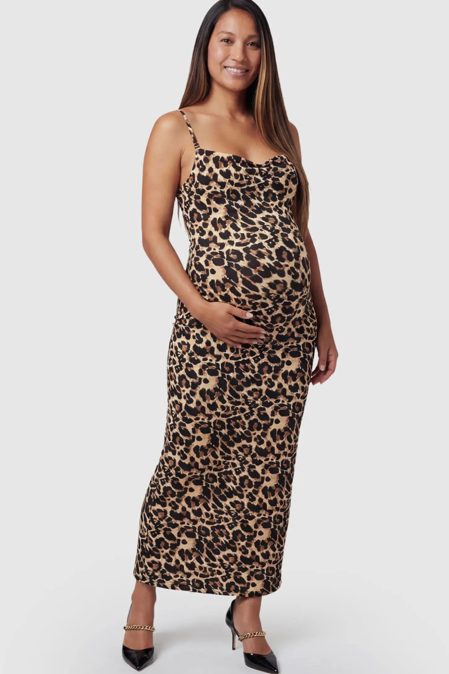 Leopard Print Spaghetti Strap Bodycon Maternity Maxi Dress featuring a slim-fitting silhouette on a pregnant model.