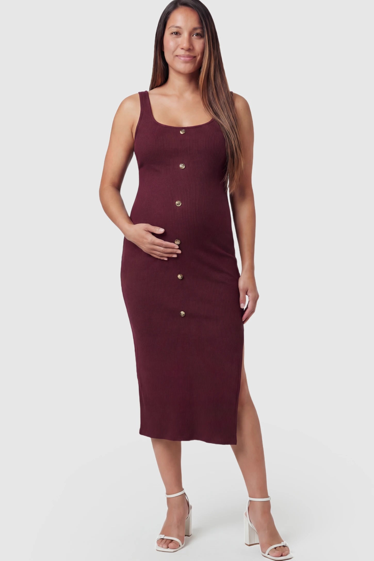 Ribbed Button Accent Side Slit Maternity Midi Dress in Burgundy featuring a flexible knit and decorative buttons on a pregnant model.
