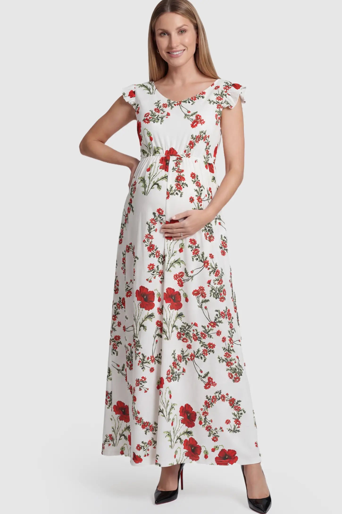 Floral Print Scoop Neck Maxi Maternity Dress in White with Red Poppy Prints featuring ruffle sleeves on a pregnant model.