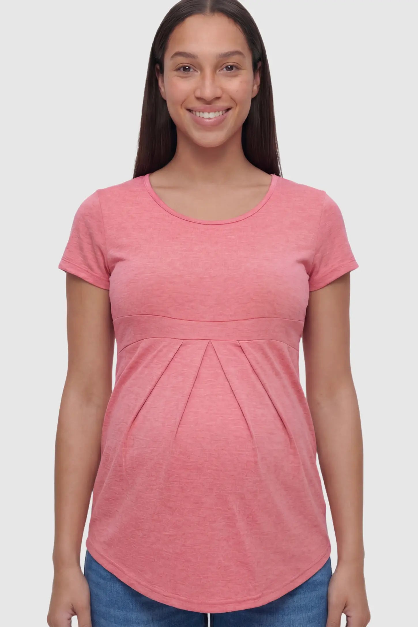 Pleated Heathered Short Sleeve Maternity Top in Pink featuring an empire waist on a pregnant model.