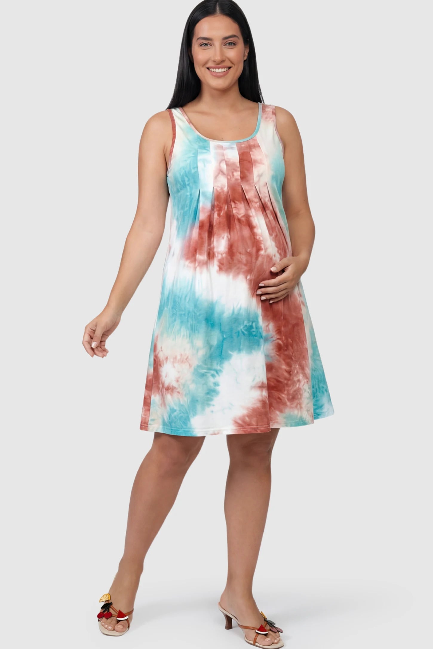 Tie-Dye Print Scoop Neck Pleated Maternity Dress in Light Brown featuring vertical bodice pleats on a pregnant model.