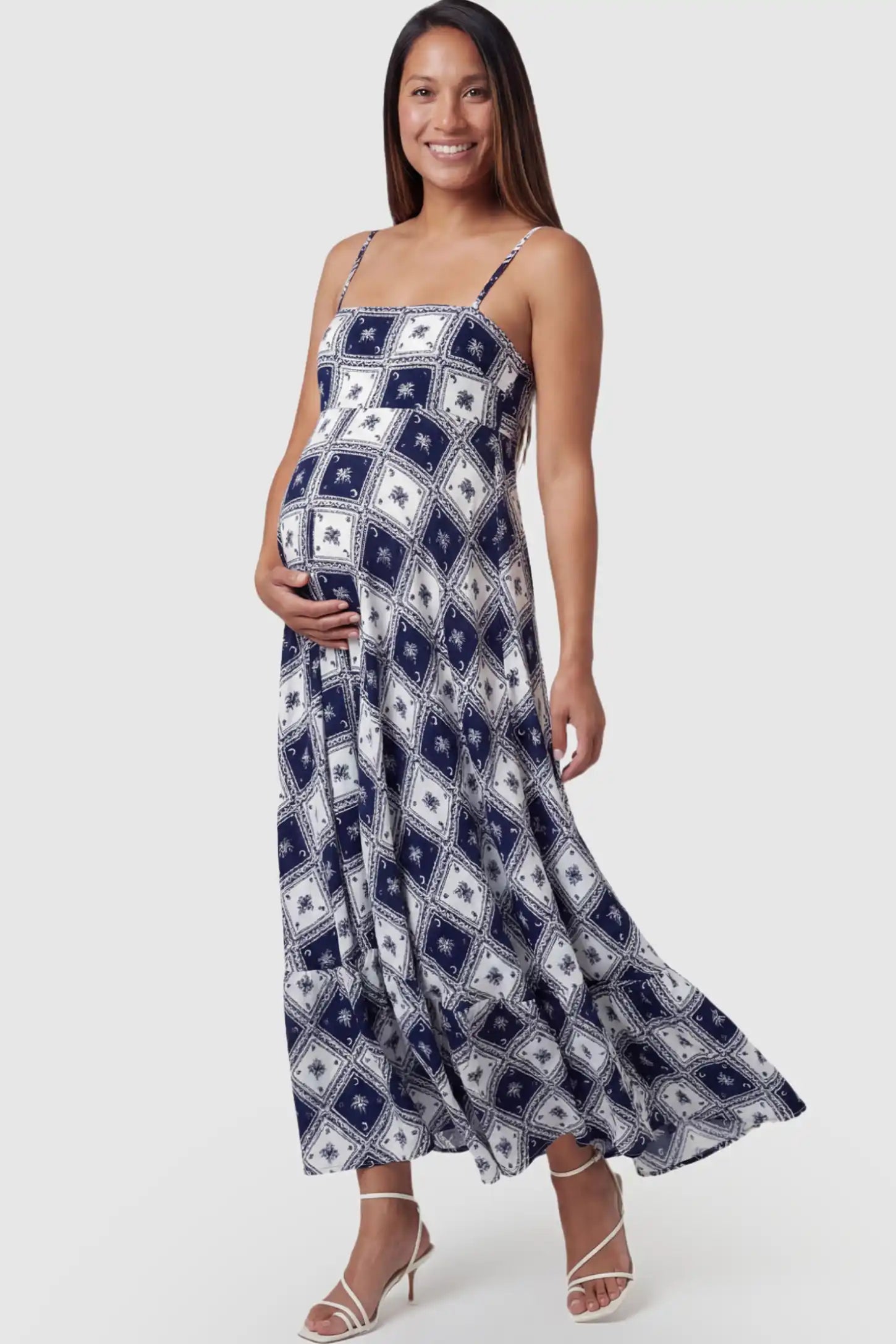 Black Square Print Spaghetti Strap Maternity Maxi Dress in a geometric tile pattern on a pregnant model.