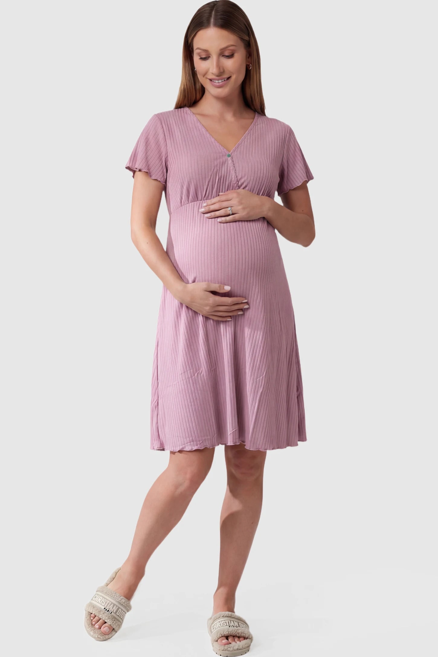 Wrap Style Ribbed Maternity & Nursing Midi Lounge Dress in Dusty Pink featuring wrap-style front for easy nursing access on pregnant model showing front.
