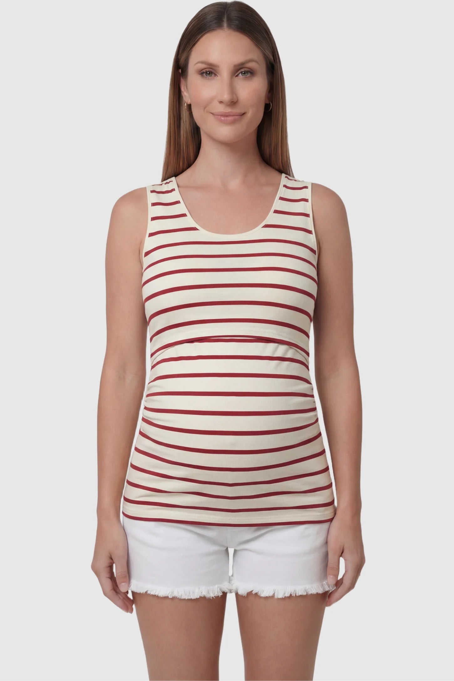 Concealed Nursing Opening Sleeveless Maternity & Nursing Top in Red and White Stripes featuring a sleeveless cut and hidden nursing access shown in front view on a pregnant model.