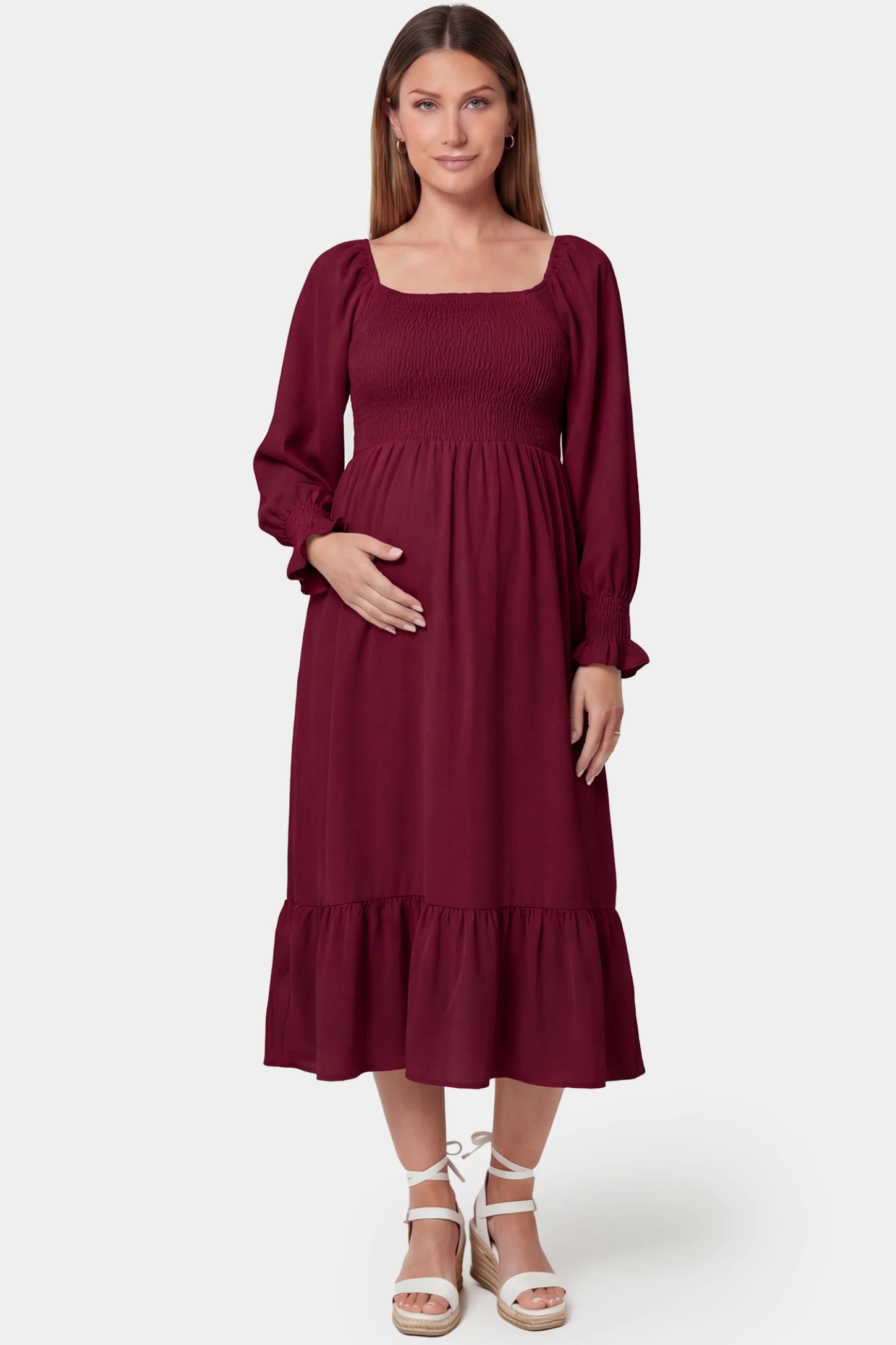 Smocked square neck ruffle hem midi maternity dress in burgundy featuring chic square neckline in front view on a pregnant model