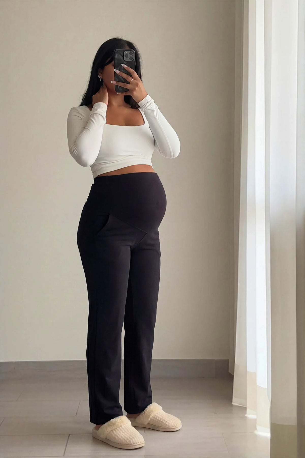 High Waisted Straight-Leg Maternity Pants in black featuring over-the-belly support and standard length fit on pregnant model.