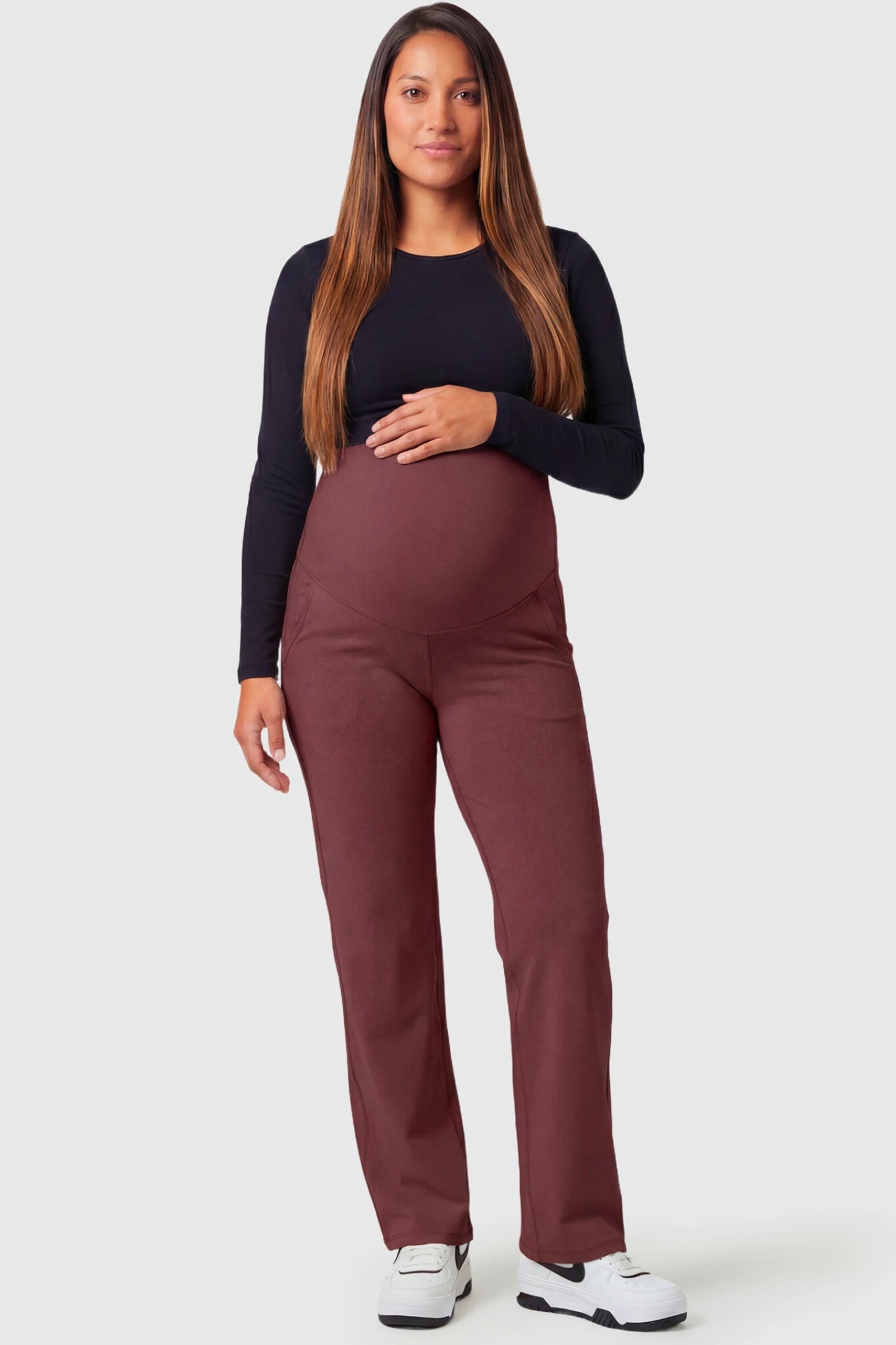 High Waisted Straight-Leg Maternity Pants in wine red featuring over-the-belly support and standard length fit on pregnant model.