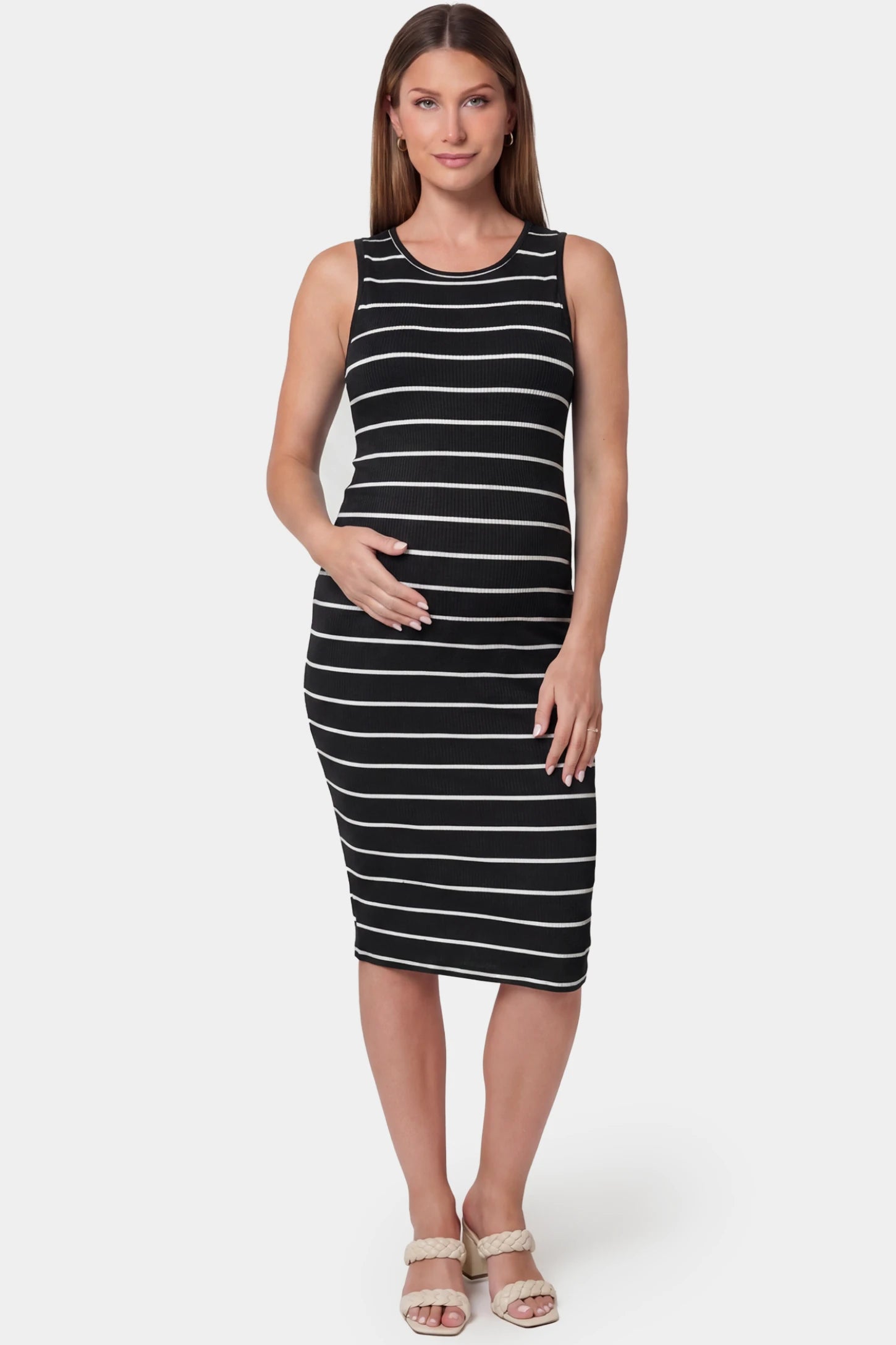 Striped sleeveless crew neck midi maternity dress in black featuring classic stripe pattern in front view on a pregnant model