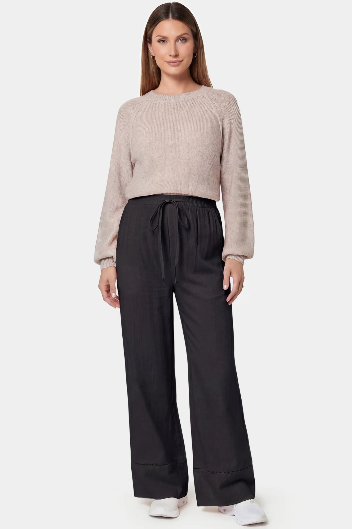 High-waist drawstring wide-leg maternity pants in black with loose silhouette, full body on pregnant model