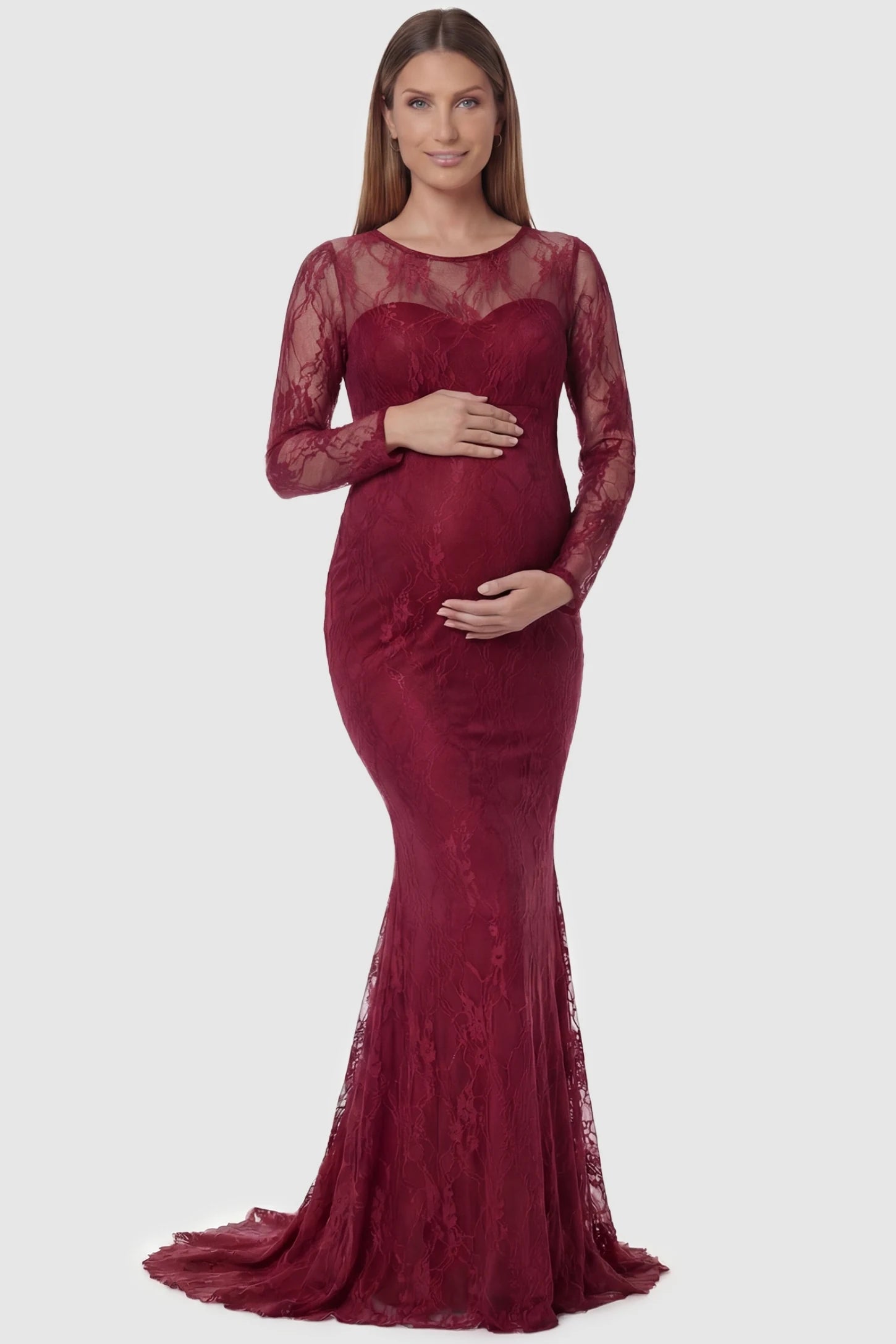 Floral Lace Long Sleeve Trumpet Maternity Photoshoot Gown in Wine Red featuring a sheer round neckline on a pregnant model.