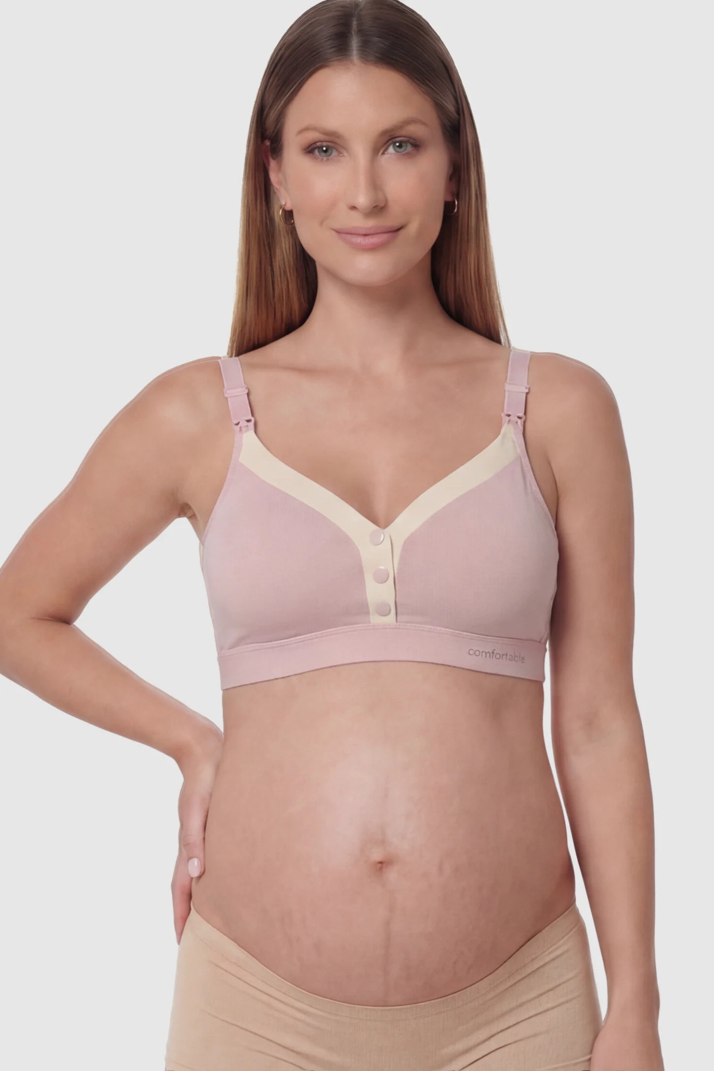Soft Cotton Front-Button Wireless Maternity & Nursing Bra in Pink featuring snap-front access on a pregnant model.