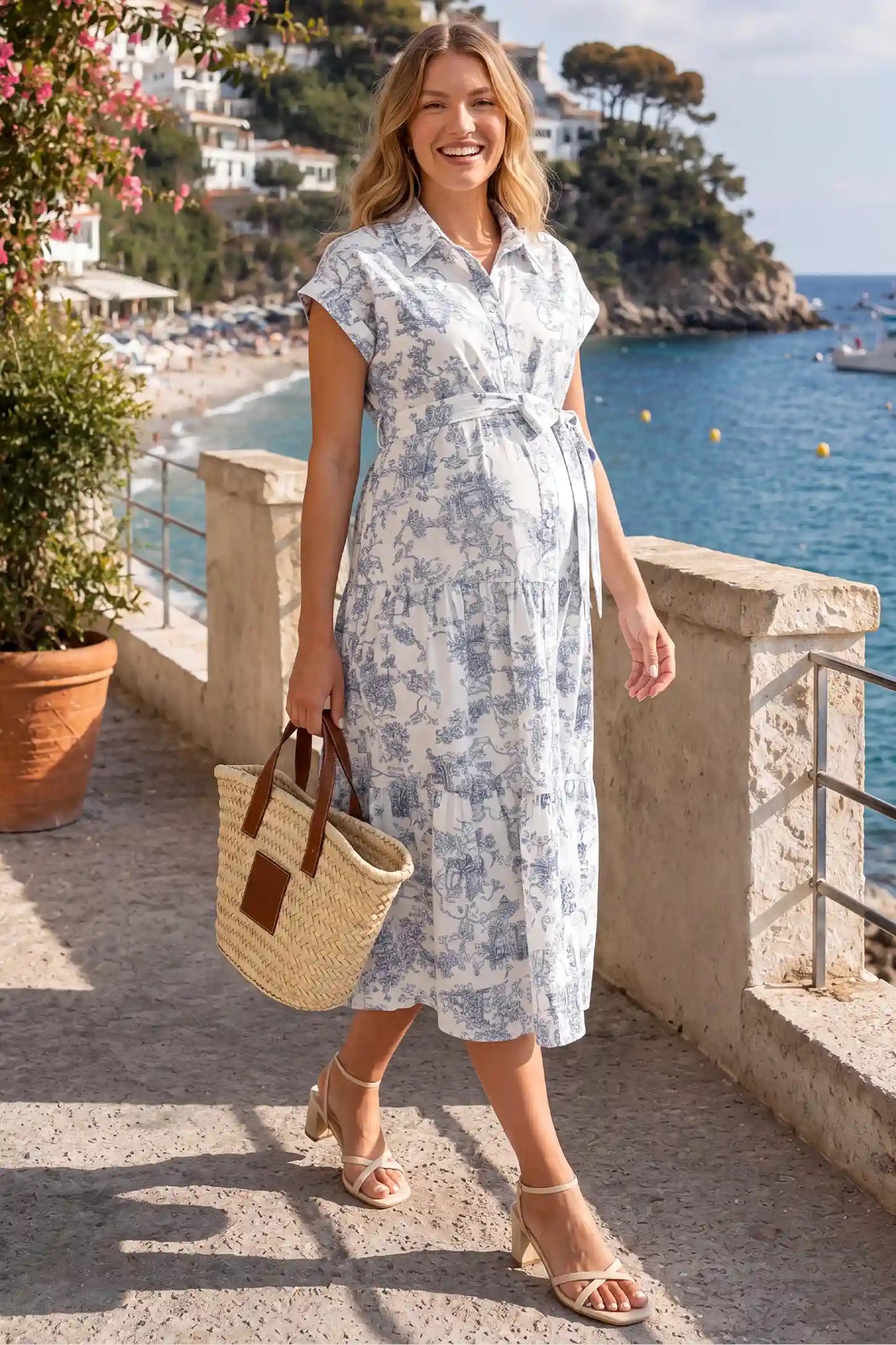 Belted V-Neck Tiered Chiffon Maternity Dress in Blue Toile, lifestyle view on a pregnant model walking.