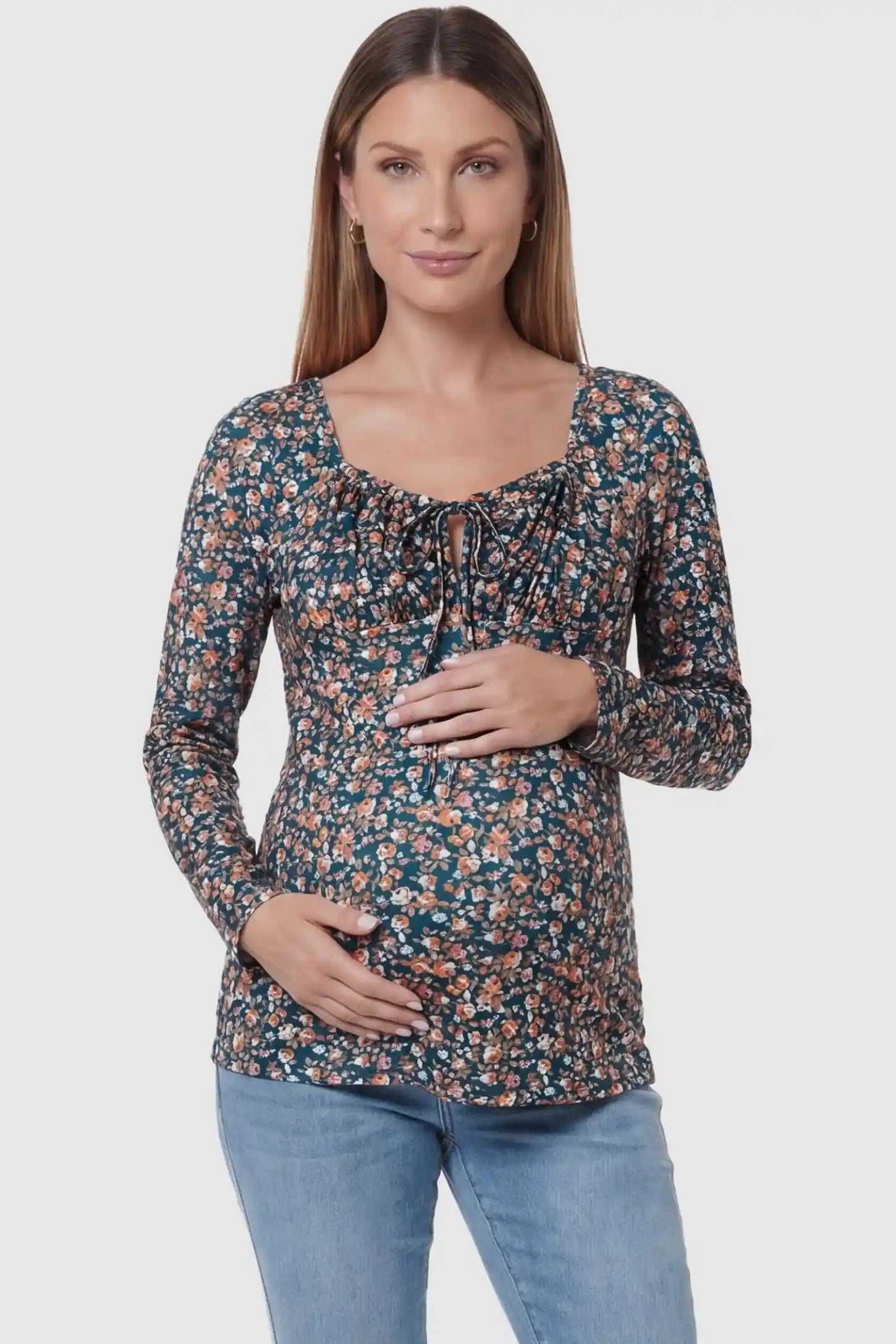 Floral Square Neck Maternity Top in floral print featuring a smocked bodice in front view on a pregnant model.