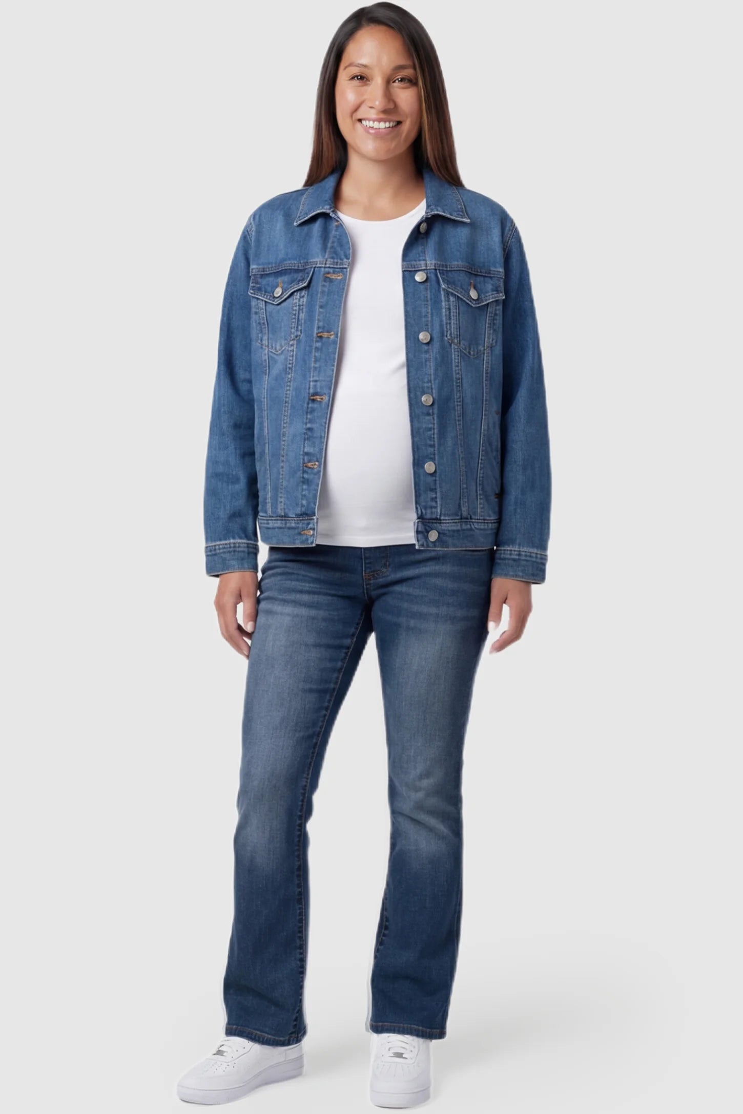 Full Panel Bootcut Maternity Jeans in medium wash blue featuring a stretchy over-the-belly panel on a pregnant model posing front.