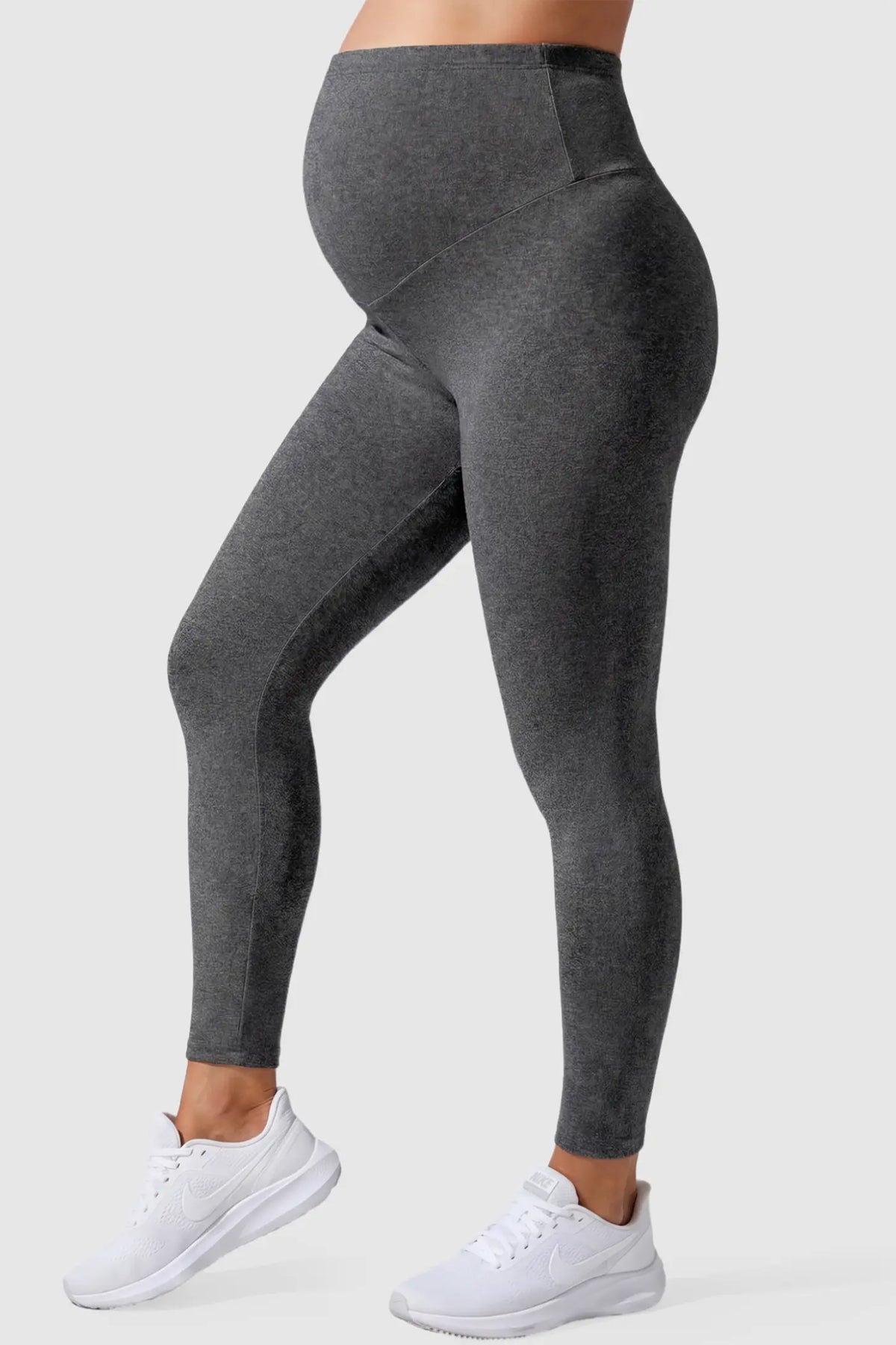 Full Panel Slim Fit Maternity Leggings in Dark Gray featuring a seamless over-the-belly waistband on a pregnant model, side view.