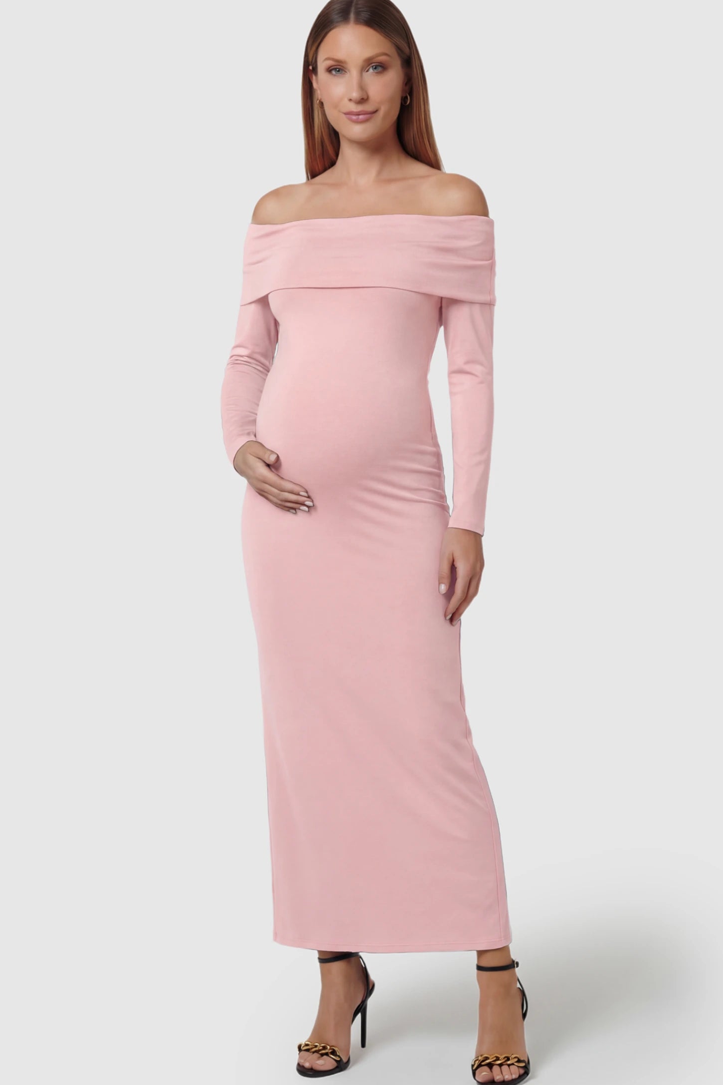 Off Shoulder Bodycon Maternity Maxi Dress in Pink featuring a smooth stretch finish on a pregnant model showing front.