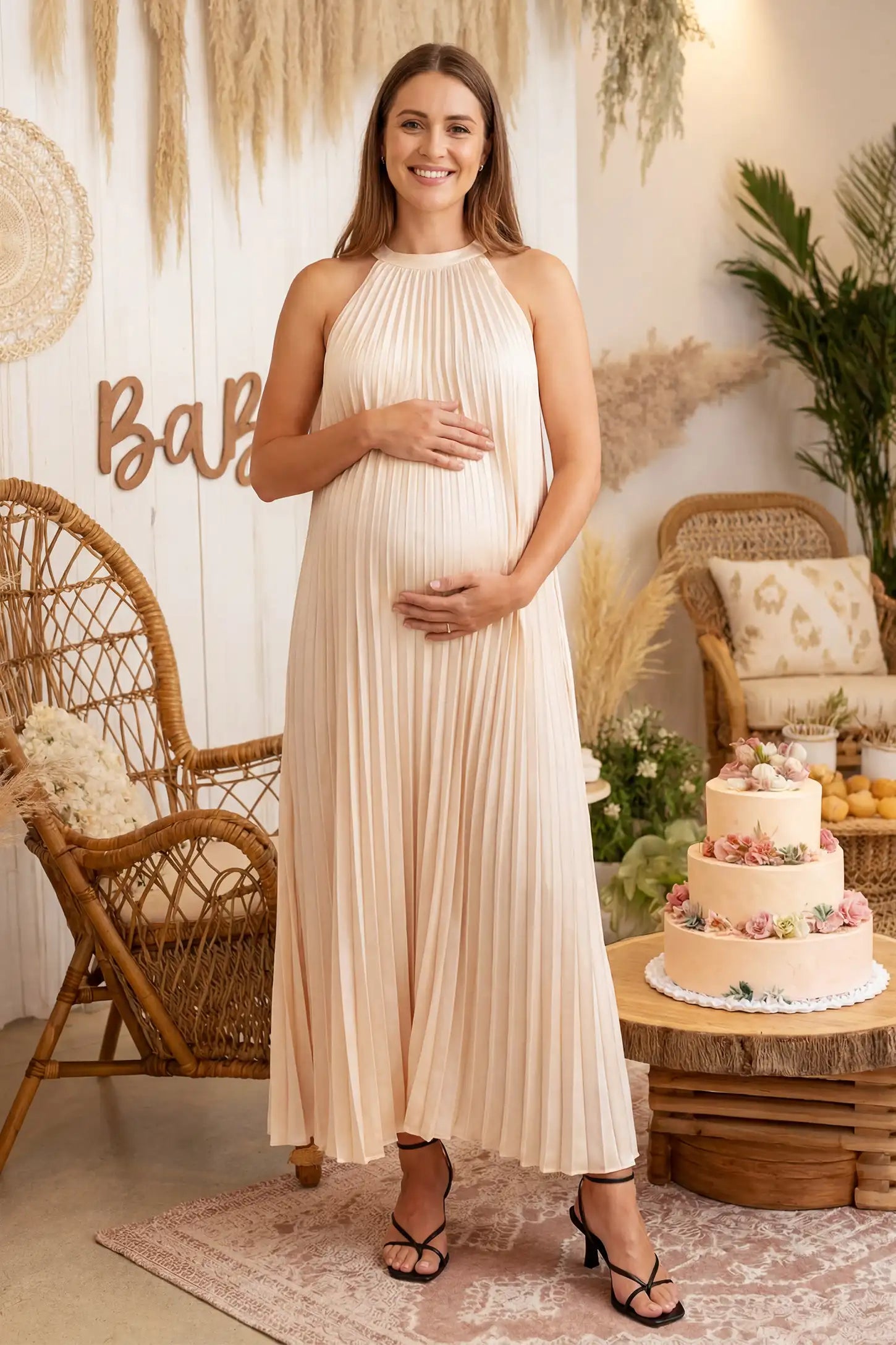 Pleated Faux Silk Halter Maternity Maxi Dress in Champagne featuring micro-pleat texture on a pregnant model.