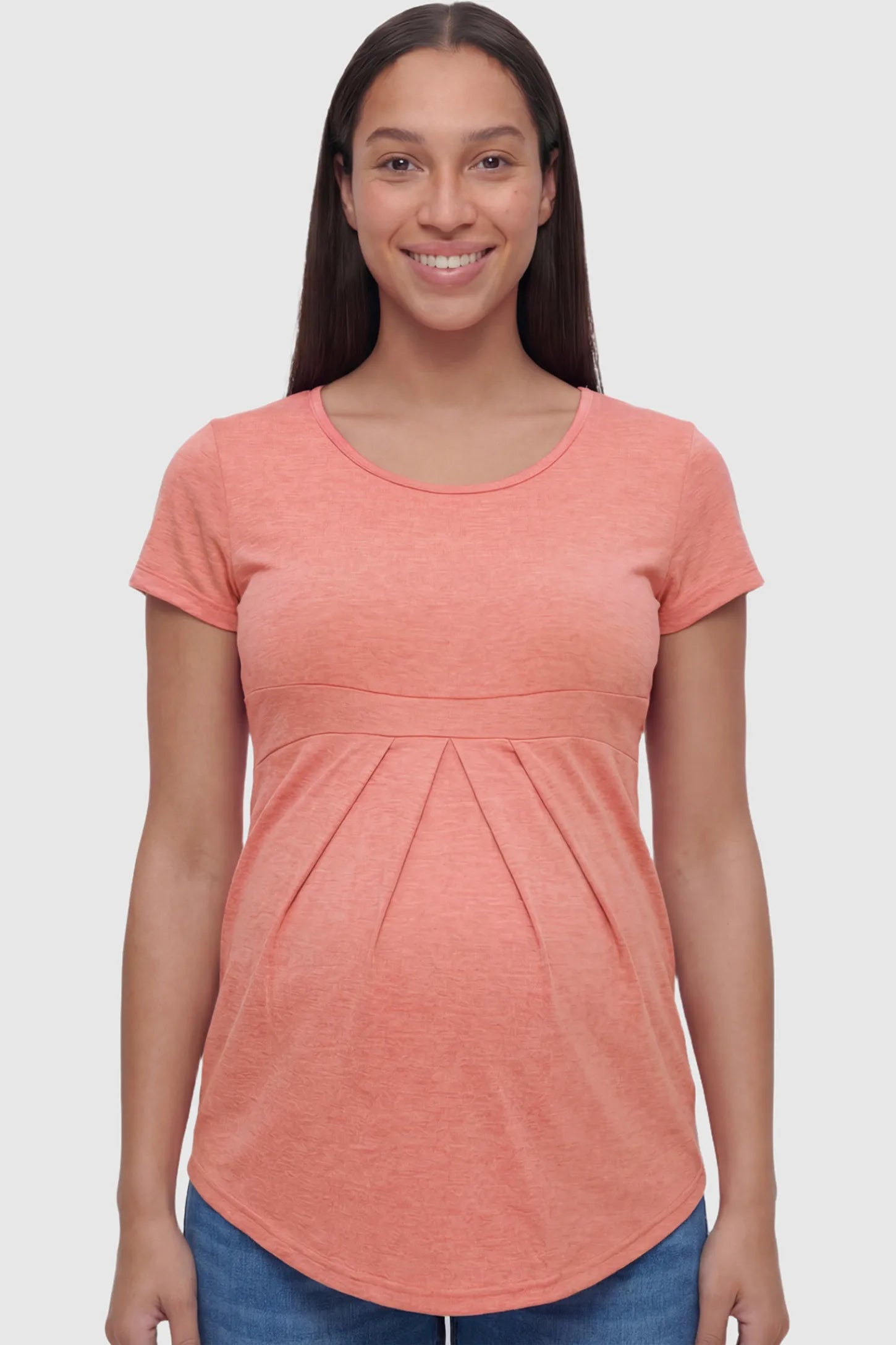 Pleated Heathered Short Sleeve Maternity Top in pink featuring high stretch and breathable fabric on a pregnant model facing front.