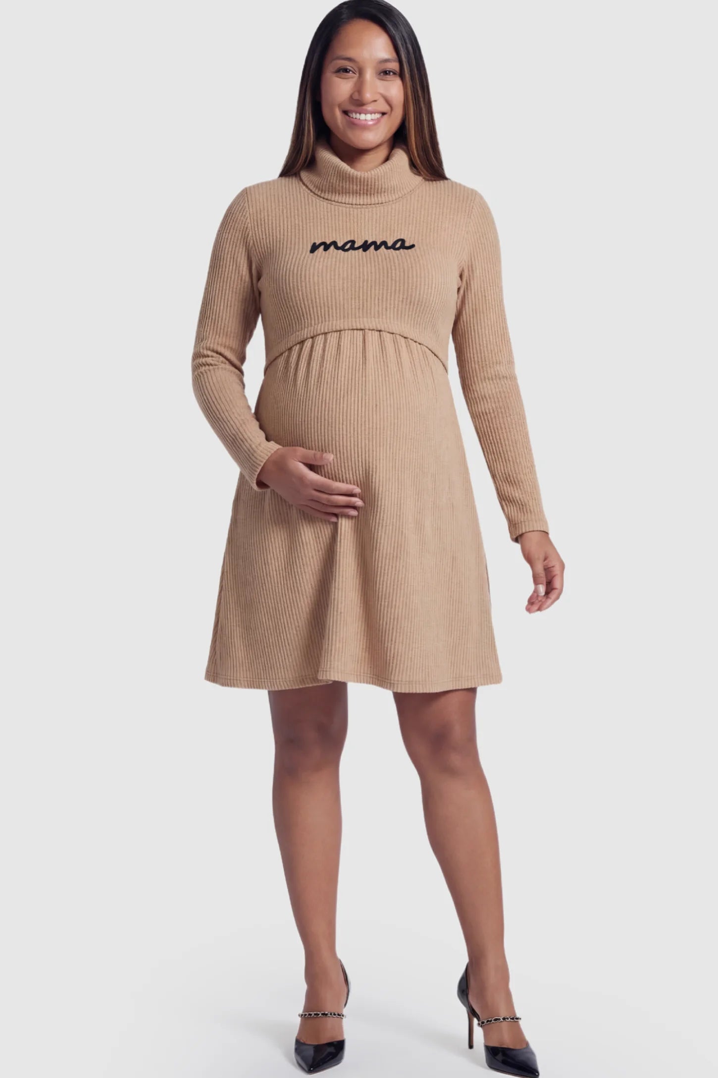 Ribbed Double-Layer Turtleneck Maternity Nursing Dress in Brown featuring "mama" embroidery on a pregnant model posing front.