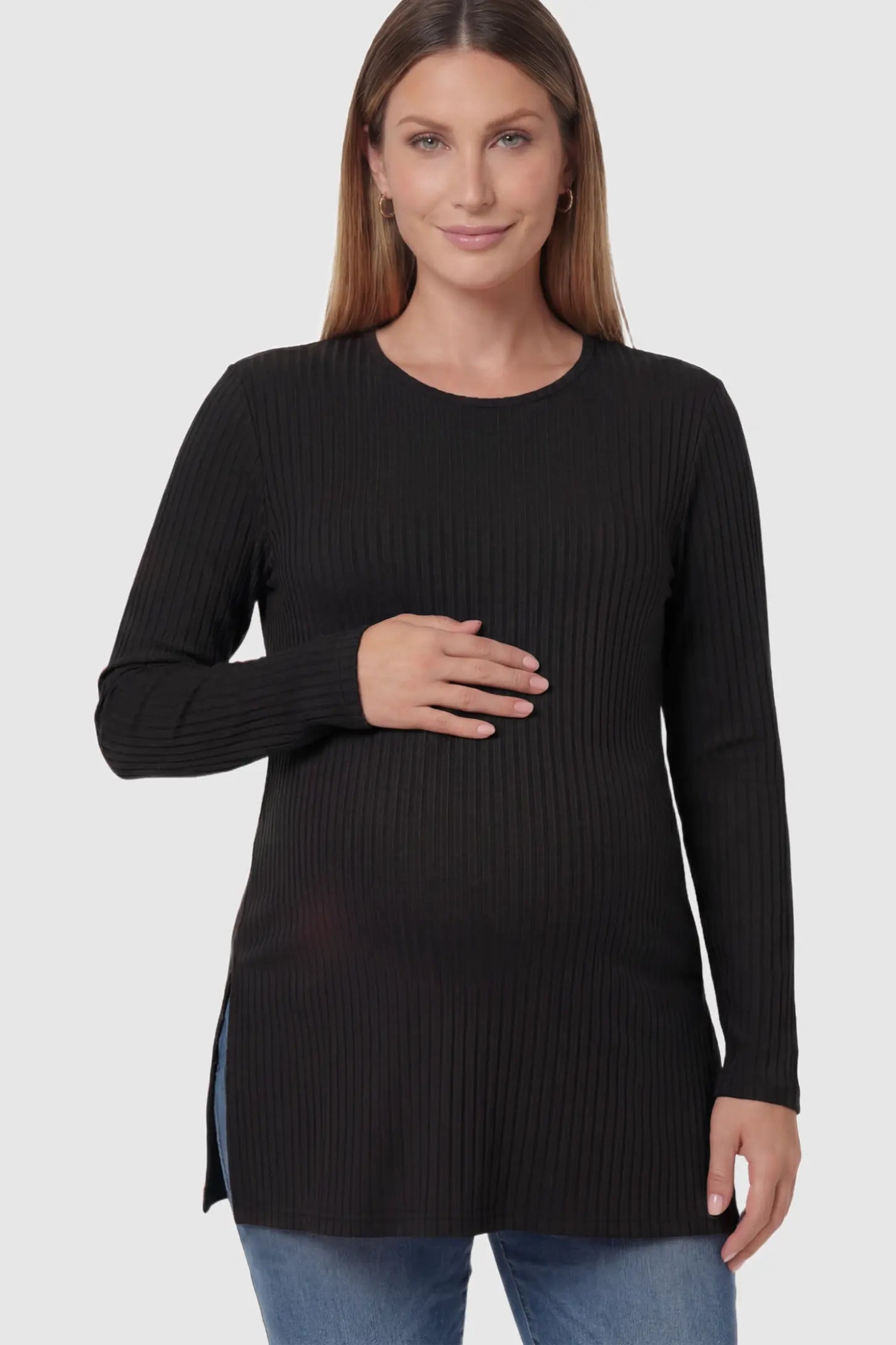 Ribbed Knit Side Slit Maternity Top in Black featuring high-stretch fabric and tunic length on a pregnant model posing front.