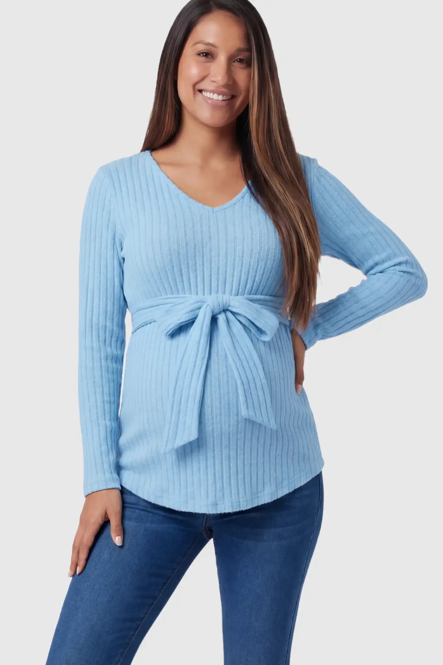 Ribbed Front Tie-Waist Long Sleeve Maternity Top in blue featuring a stretch knit fabric on a pregnant model.