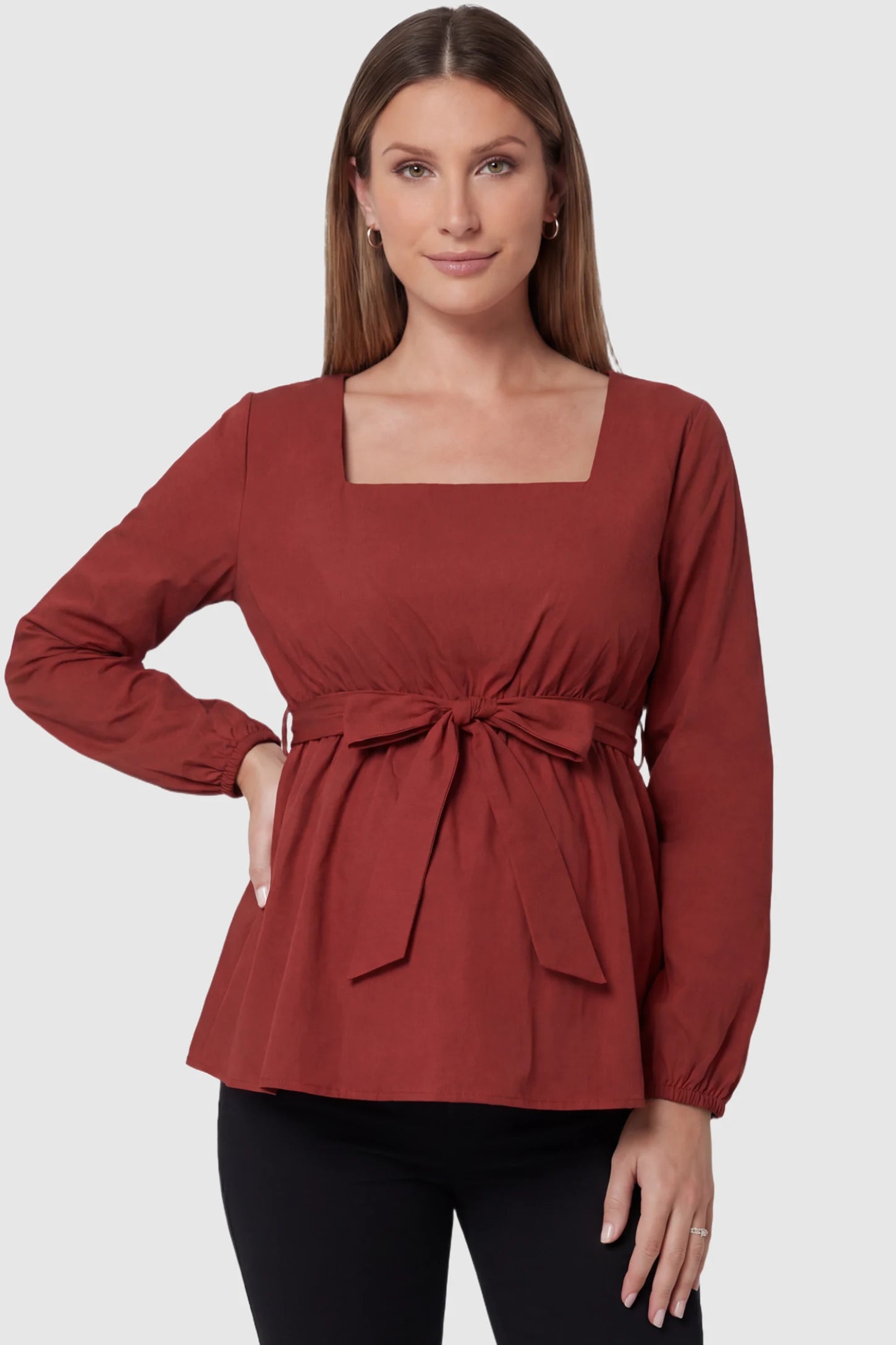 Solid Square Neck Empire Waist Maternity Top in Burgundy featuring a lightweight peplum silhouette on a pregnant model front view.