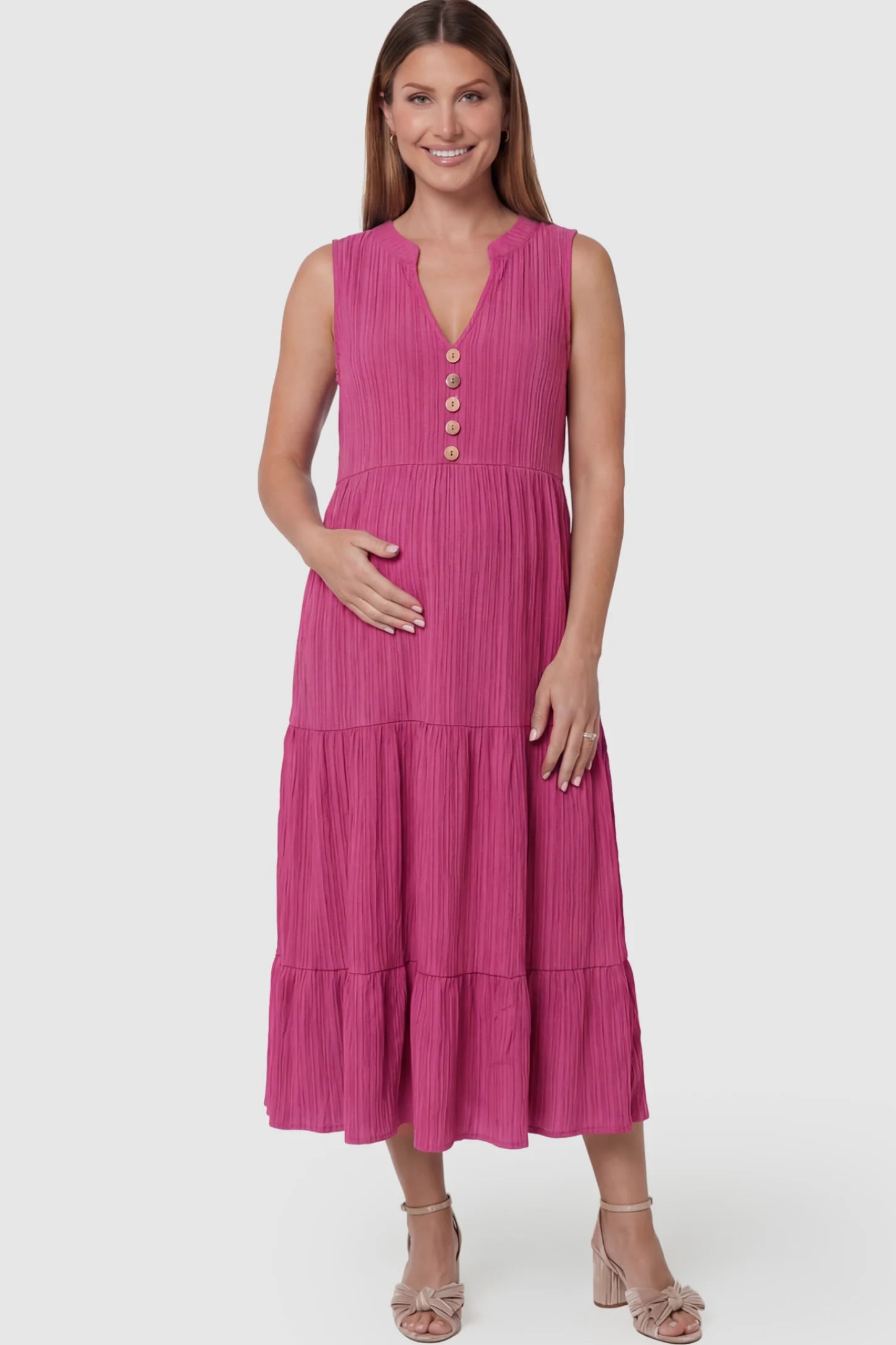 Solid Textured V-Neck Tiered Maternity Midi Dress in Rose Red featuring a high-waisted A-line silhouette on a pregnant model posing front.