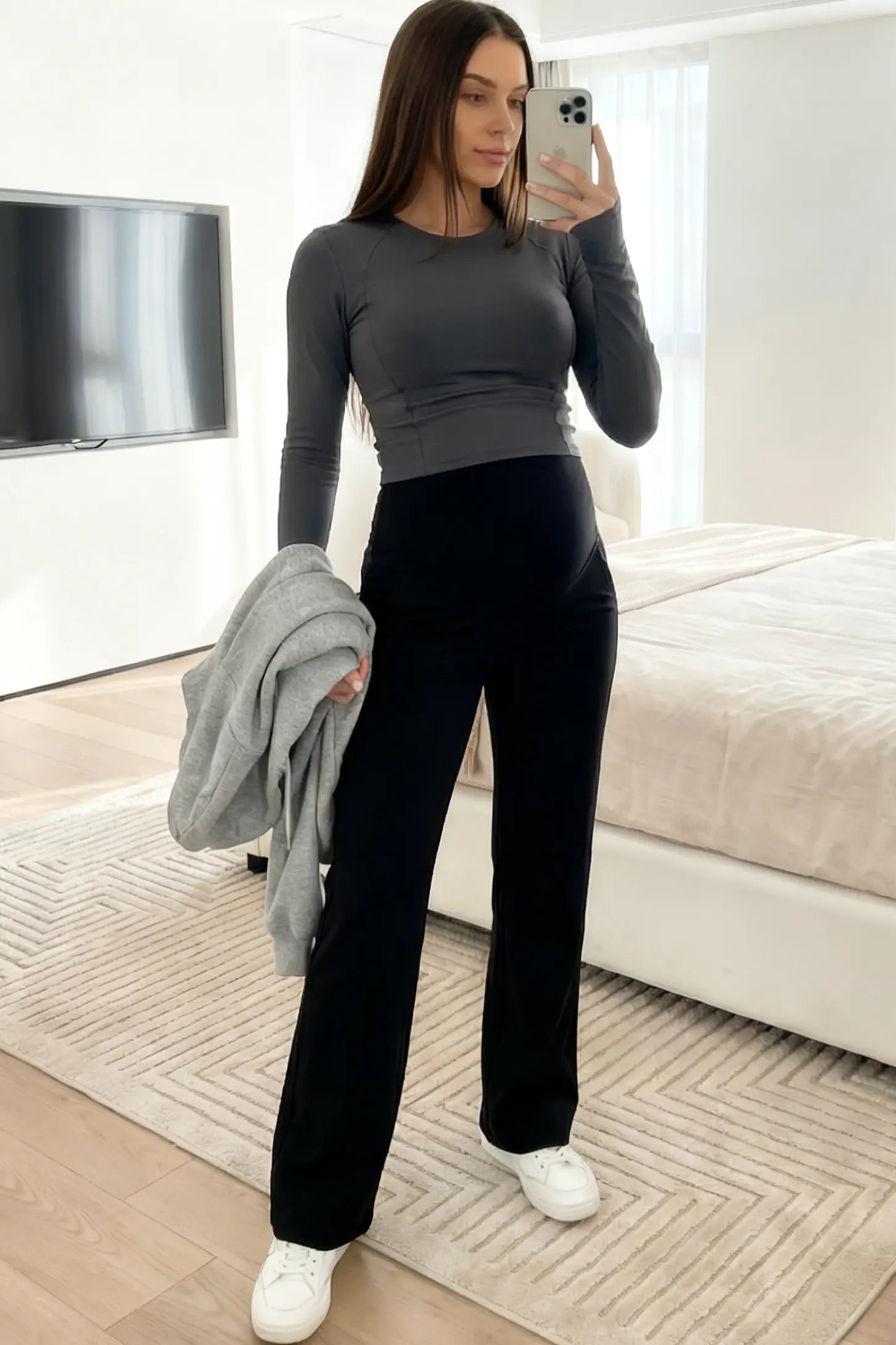 Full Panel High Waist Wide Leg Maternity Pants Full Panel High Waist Wide Leg Maternity Pants in Black featuring a supportive expansion-waist on a pregnant model showing front.