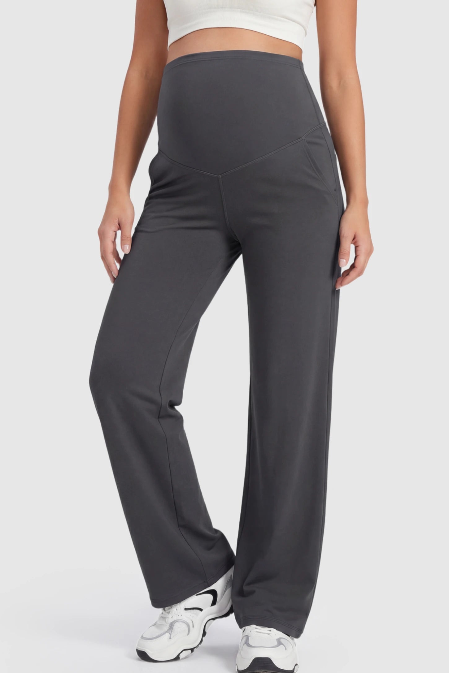 Full Panel High Waist Wide Leg Maternity Pants Full Panel High Waist Wide Leg Maternity Pants in Gray featuring a supportive expansion-waist on a pregnant model showing front.