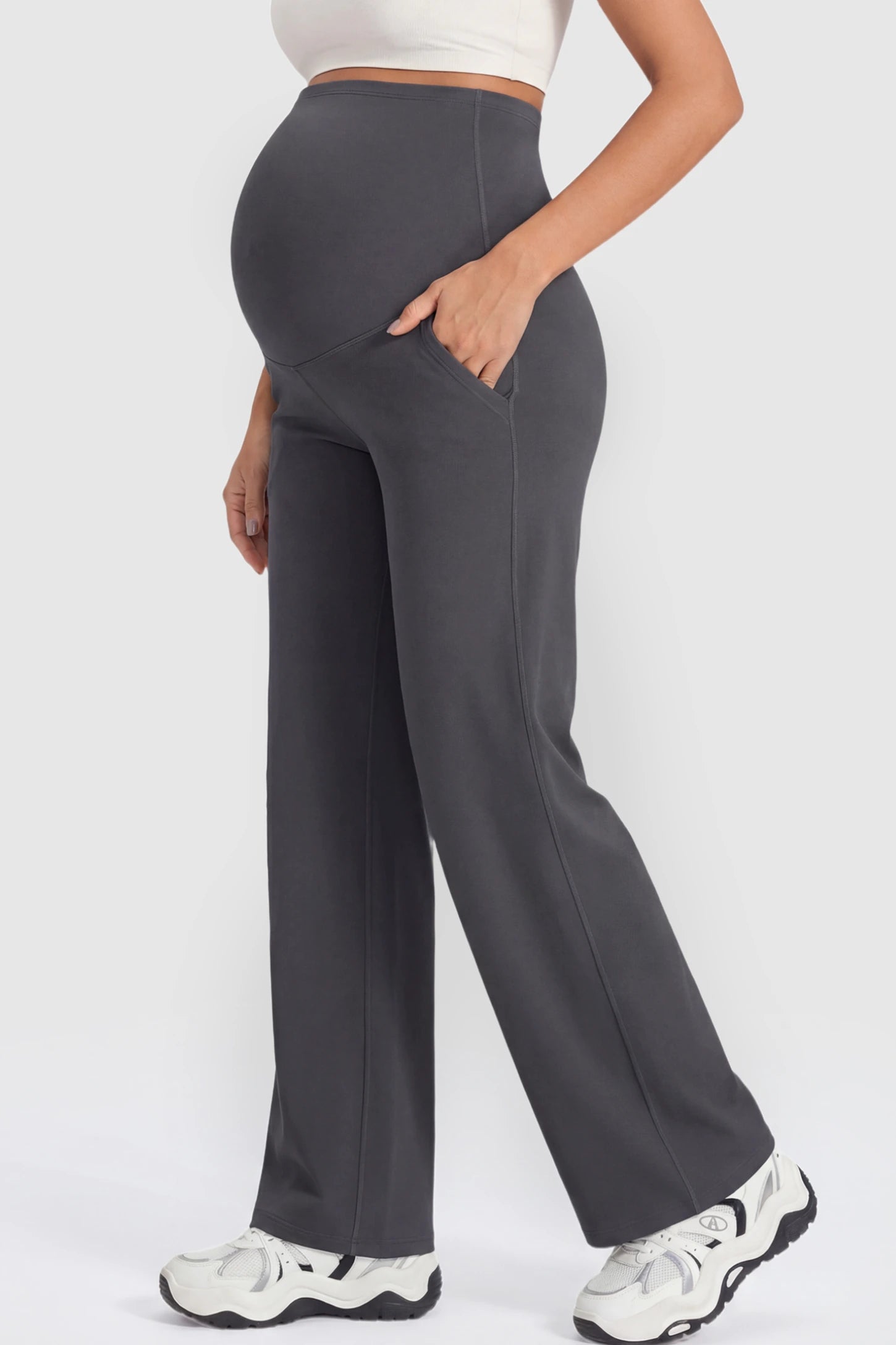 Full Panel High Waist Wide Leg Maternity Pants Full Panel High Waist Wide Leg Maternity Pants in Gray featuring a supportive expansion-waist on a pregnant model showing side.