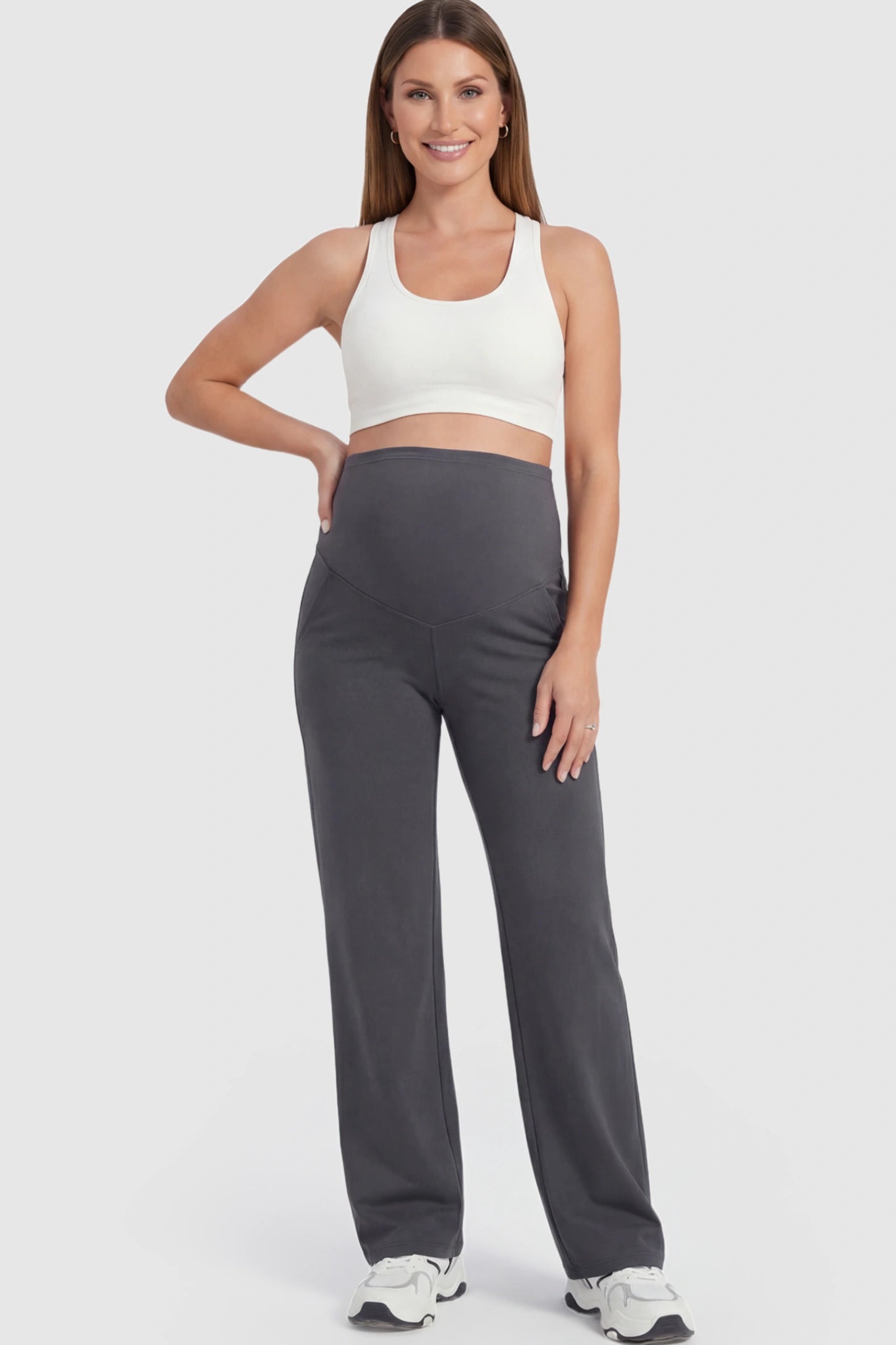 Full Panel High Waist Wide Leg Maternity Pants Full Panel High Waist Wide Leg Maternity Pants in Gray featuring a supportive expansion-waist on a pregnant model facing front.
