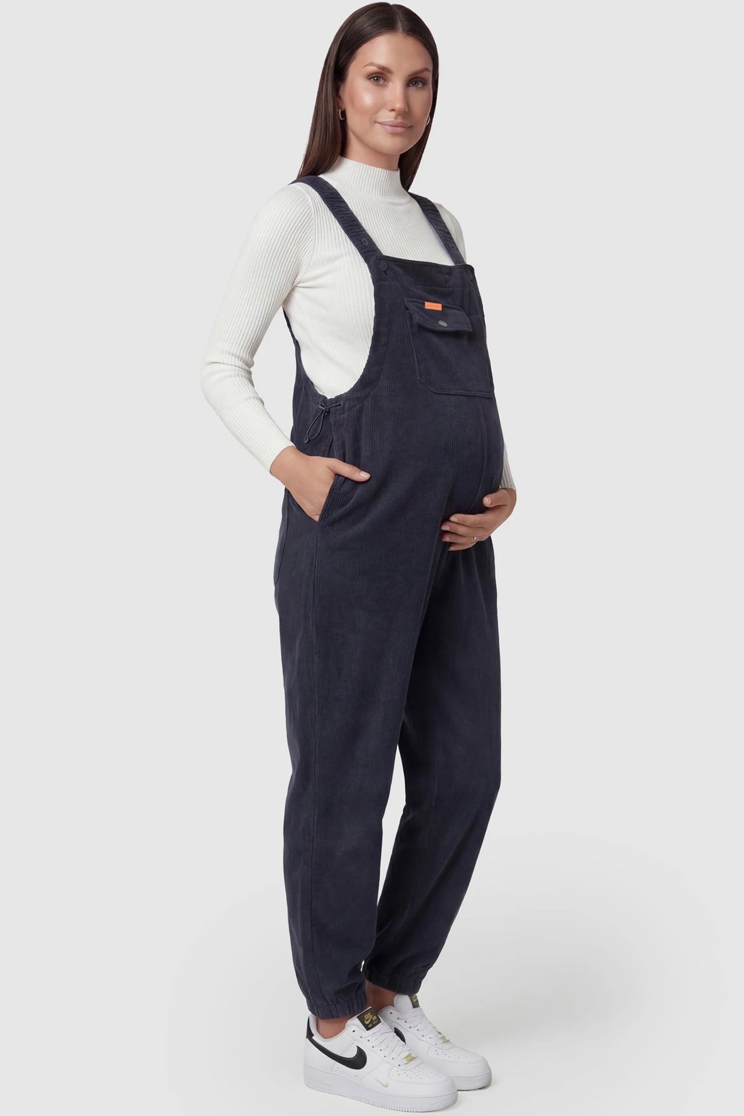 Adjustable Strap Loose Fit Maternity Overalls Adjustable strap loose fit maternity overalls in gray featuring wide leg design on a pregnant model
