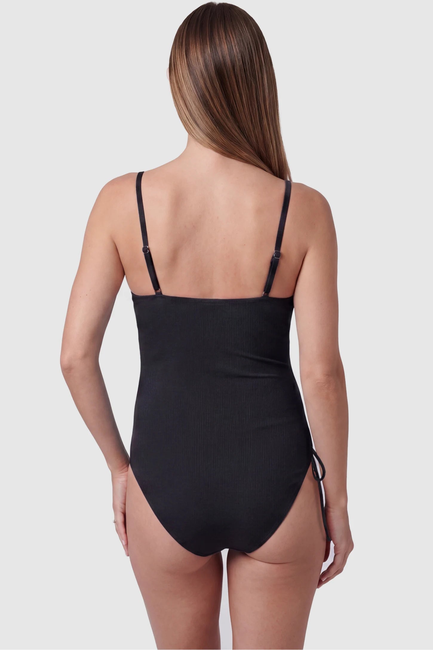 Side-Ruched Scoop Neck Maternity One-Piece Side-ruched scoop neck maternity one-piece in black with adjustable straps and stretch fabric, back view on pregnant model