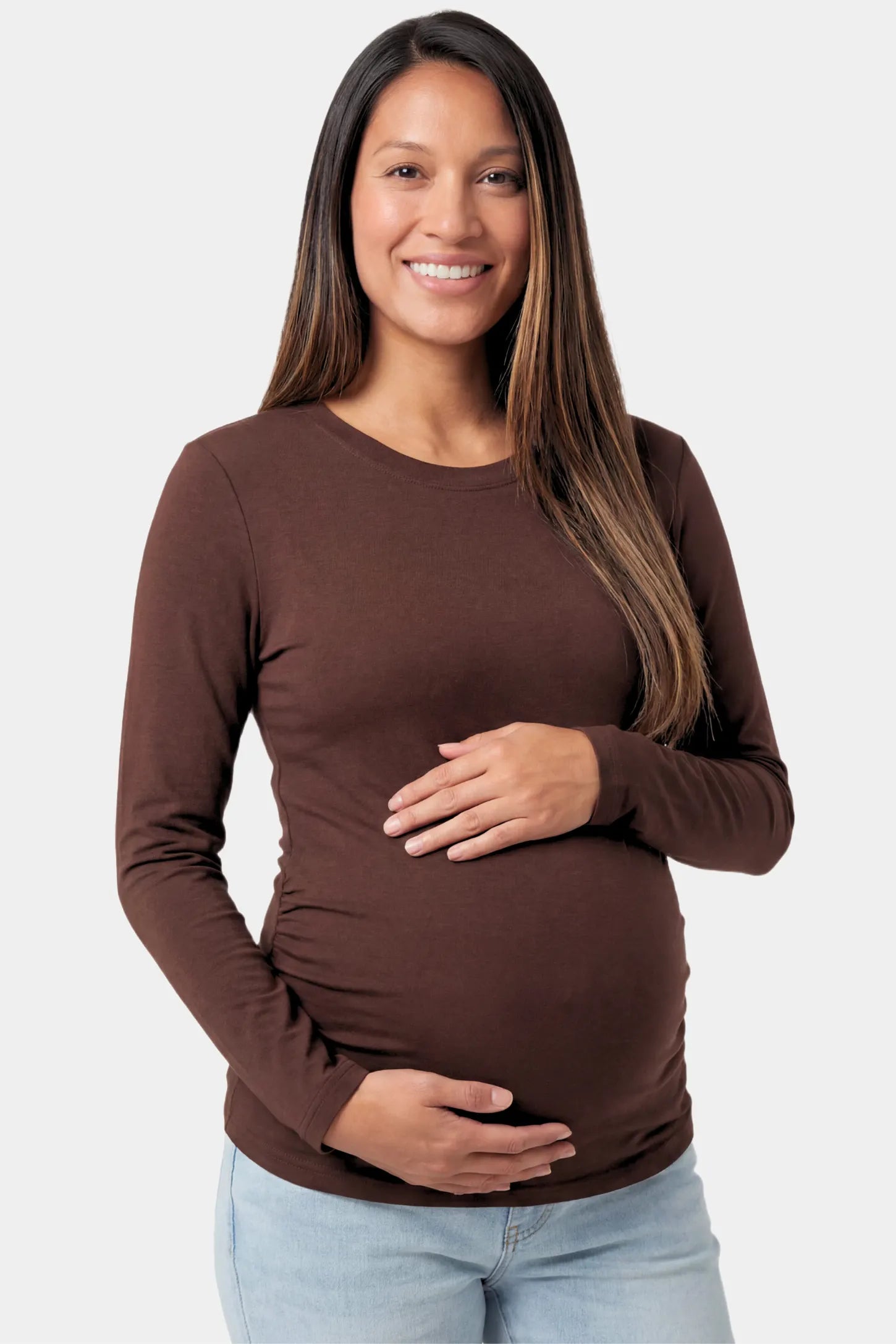 Basic Long Sleeve Maternity Top Basic Long Sleeve Maternity Top in dark brown featuring a soft crew neck and lightweight stretch fabric on a pregnant model.