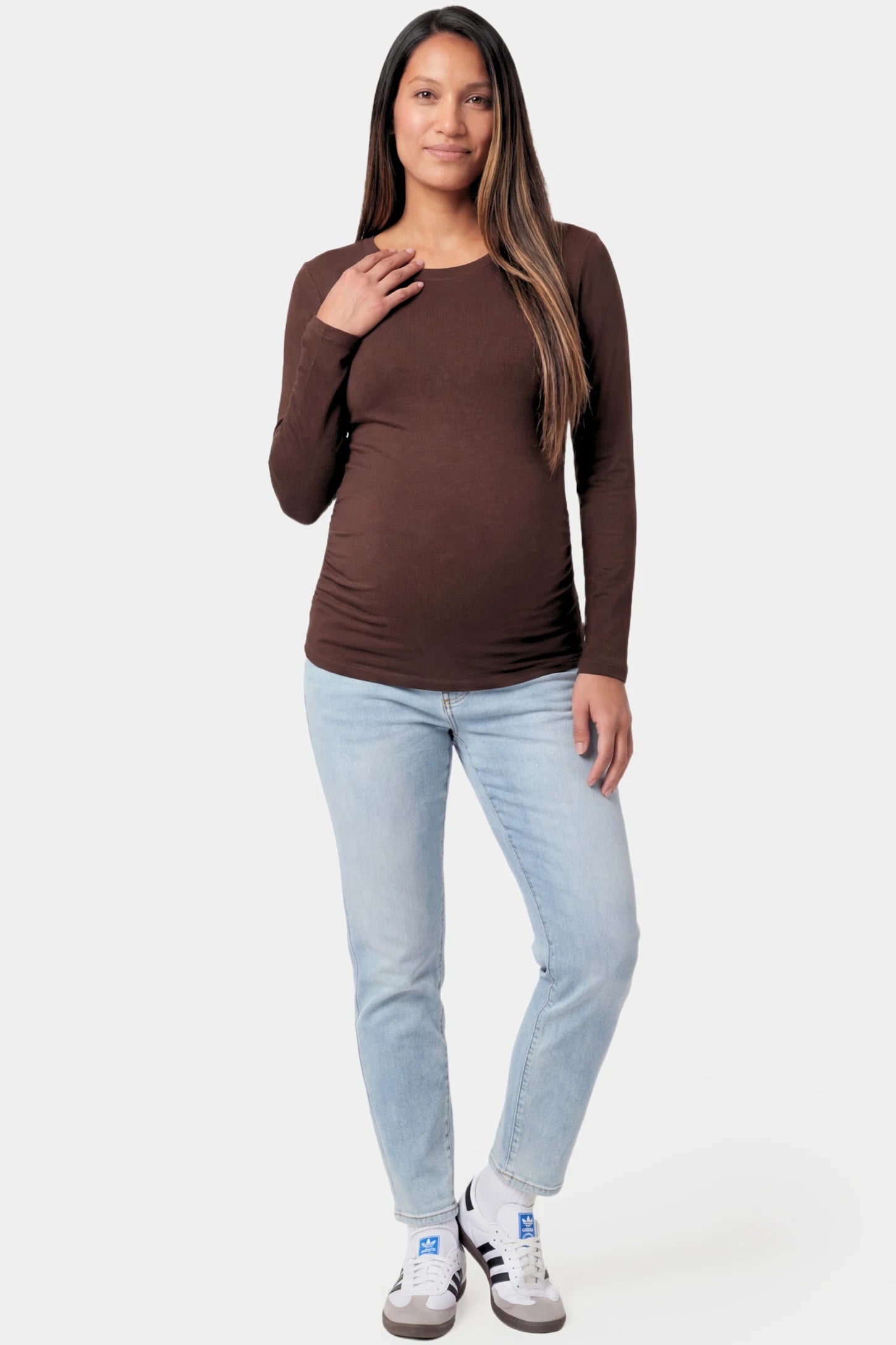 Basic Long Sleeve Maternity Top Basic Long Sleeve Maternity Top in dark brown featuring a soft crew neck and lightweight stretch fabric on a pregnant model.