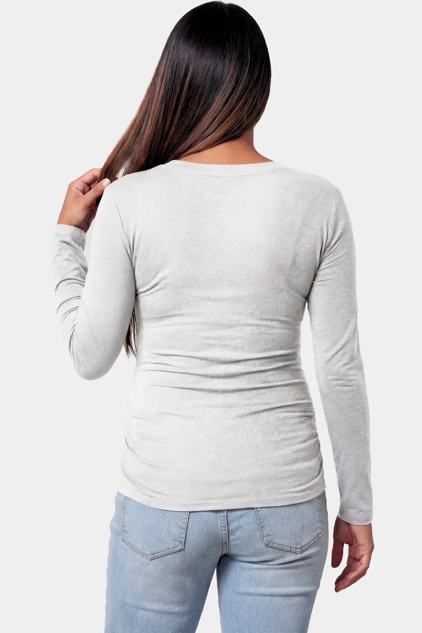 Basic Long Sleeve Maternity Top Basic Long Sleeve Maternity Top in gray featuring a soft crew neck and lightweight stretch fabric on a pregnant model.