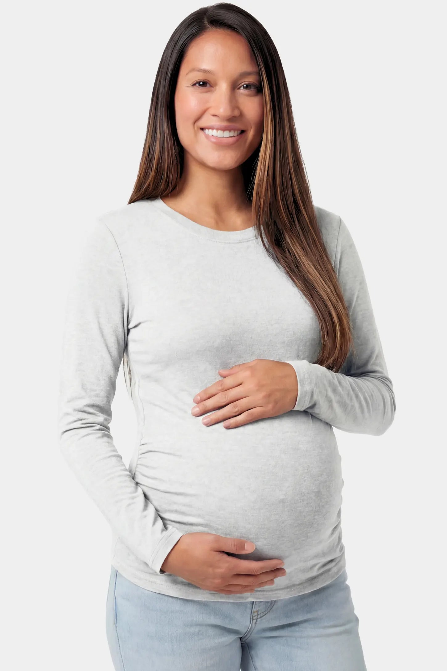 Basic Long Sleeve Maternity Top Basic Long Sleeve Maternity Top in gray featuring a soft crew neck and lightweight stretch fabric on a pregnant model.