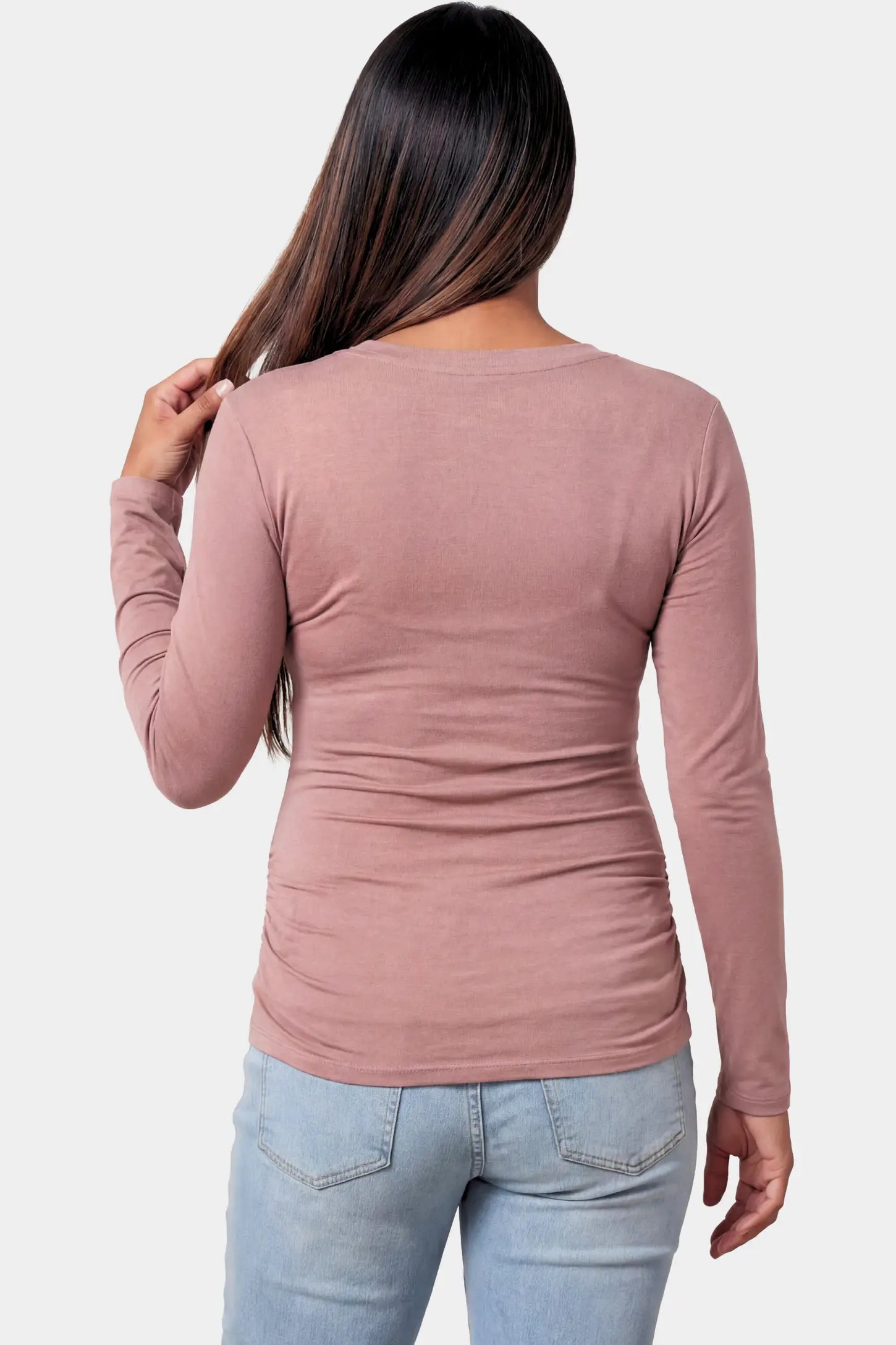 Basic Long Sleeve Maternity Top Basic Long Sleeve Maternity Top in light brown featuring a soft crew neck and lightweight stretch fabric on a pregnant model.